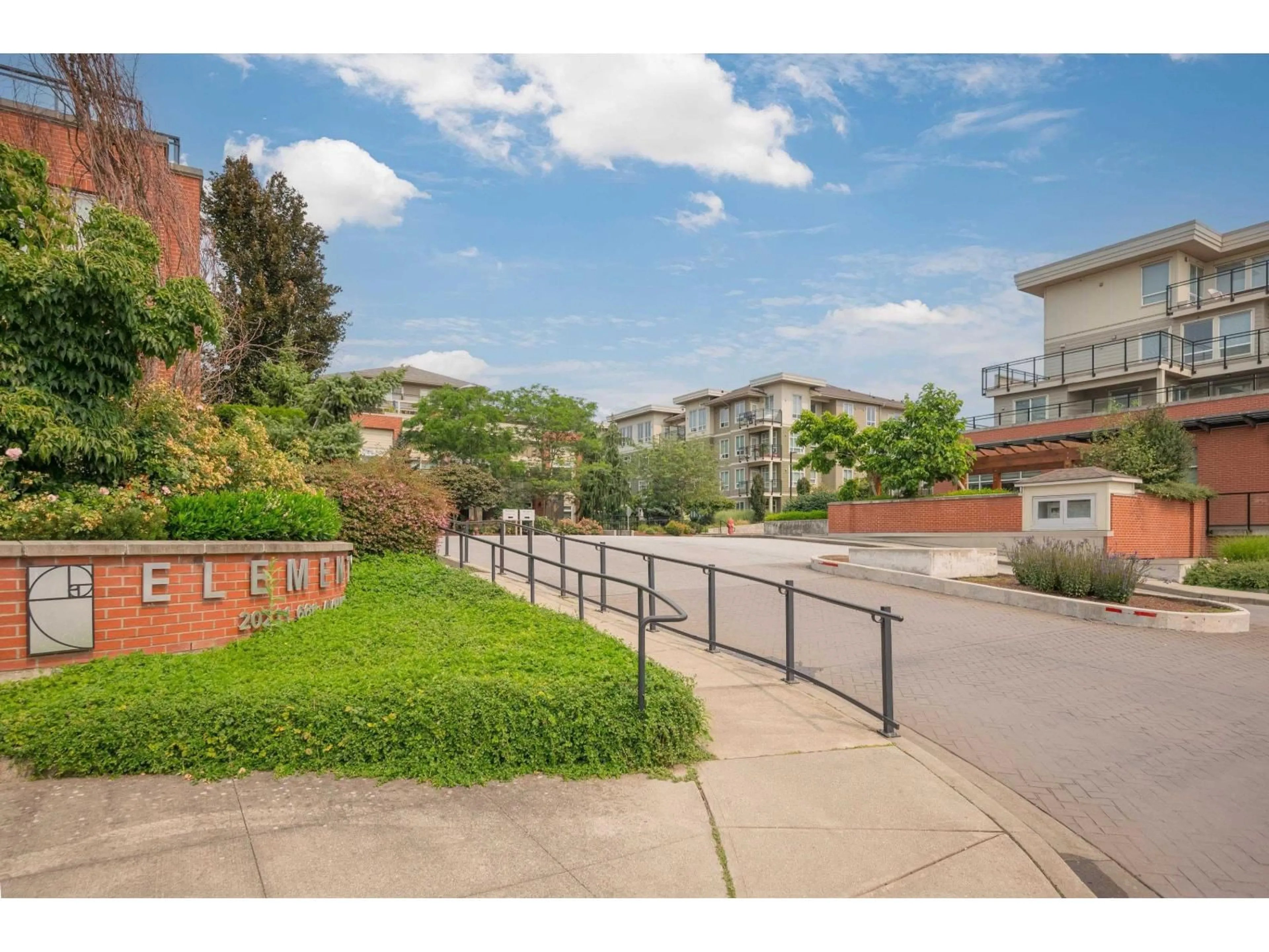 A pic from outside/outdoor area/front of a property/back of a property/a pic from drone, street for D405 - 20211 66 AVENUE, Langley British Columbia V2Y0L4