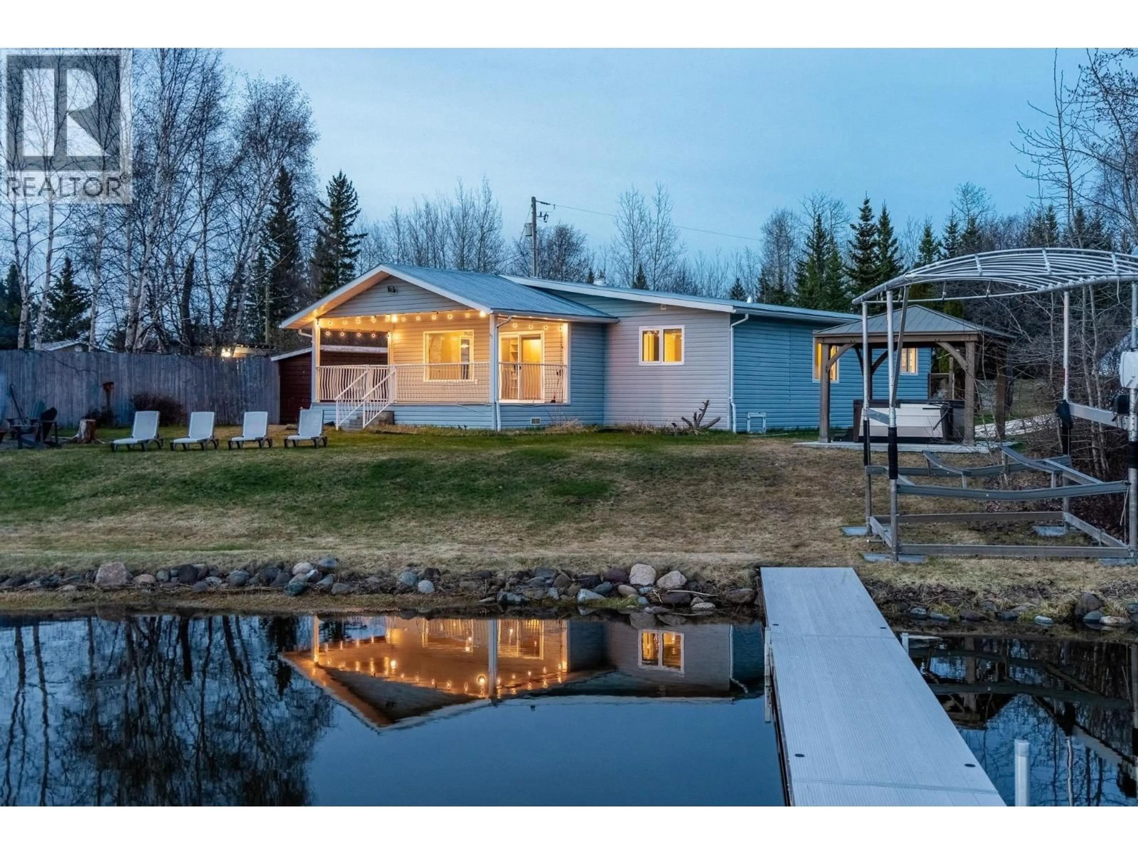 Home with vinyl exterior material, water/lake/river/ocean view for 55680 JARDINE LOOP, Cluculz Lake British Columbia V0J3A3