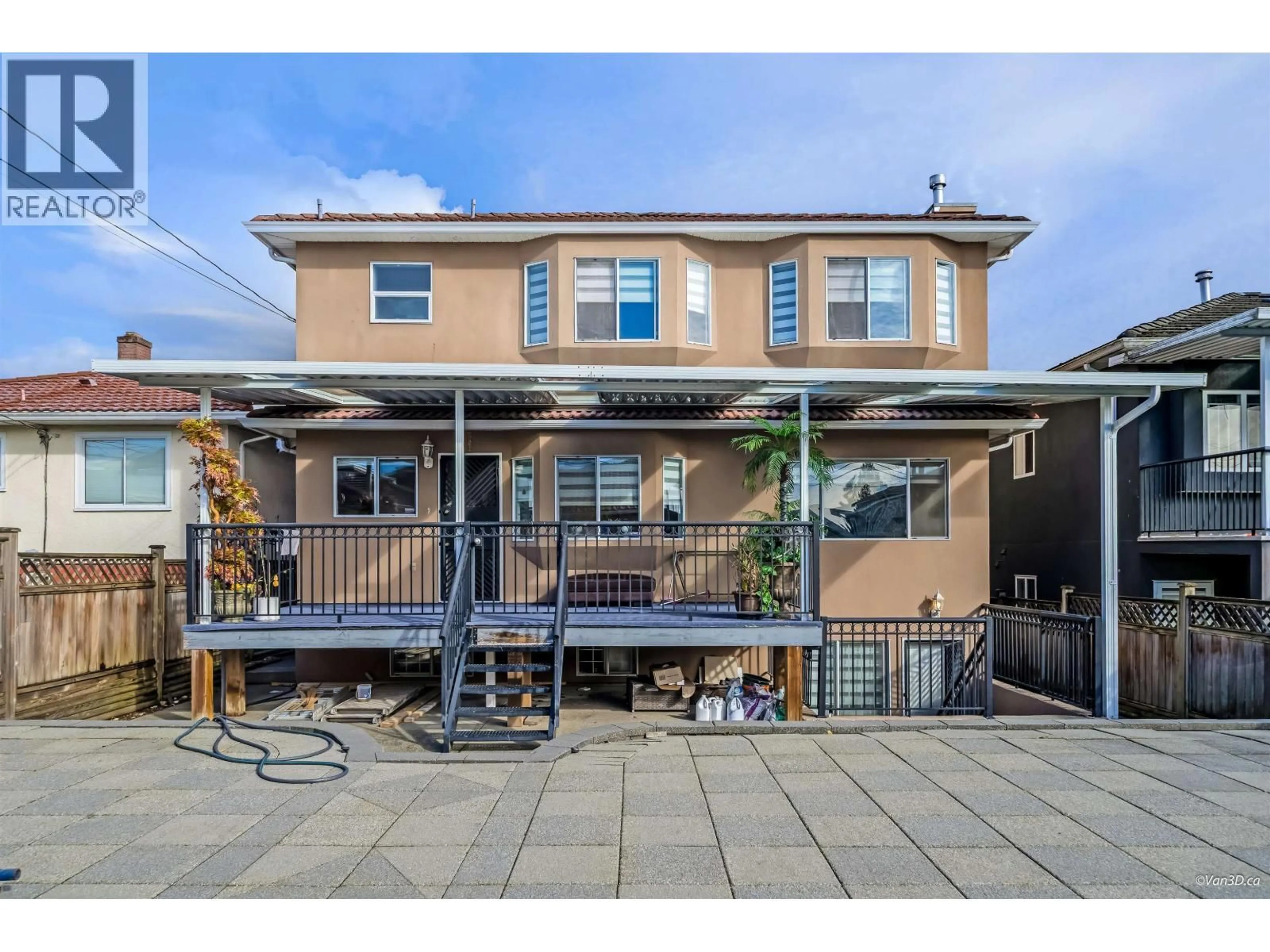 Home with vinyl exterior material, street for 6575 RALEIGH STREET, Vancouver British Columbia V5S2W9