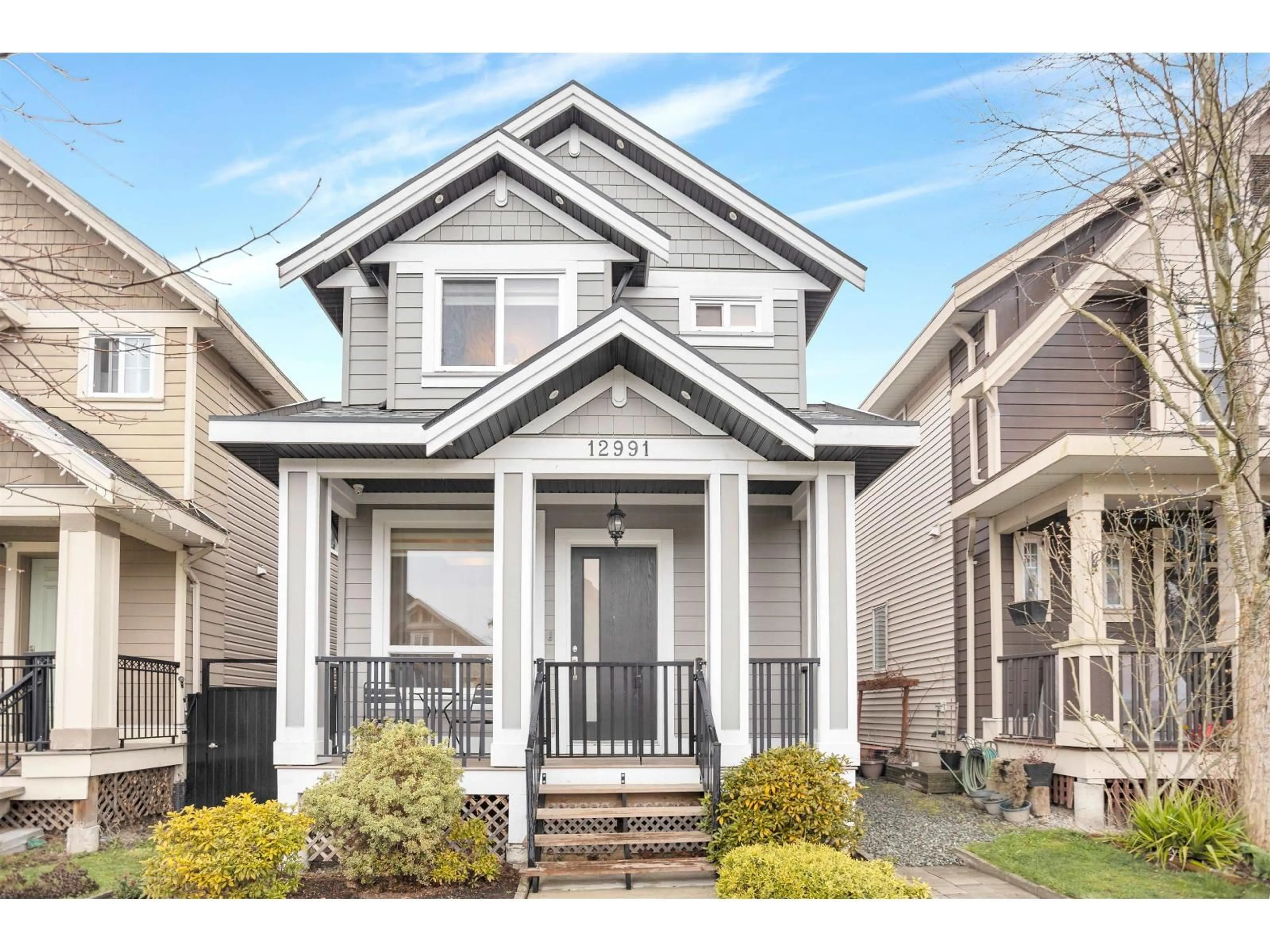 Home with vinyl exterior material, street for 12991 59 AVENUE, Surrey British Columbia V3X0C4