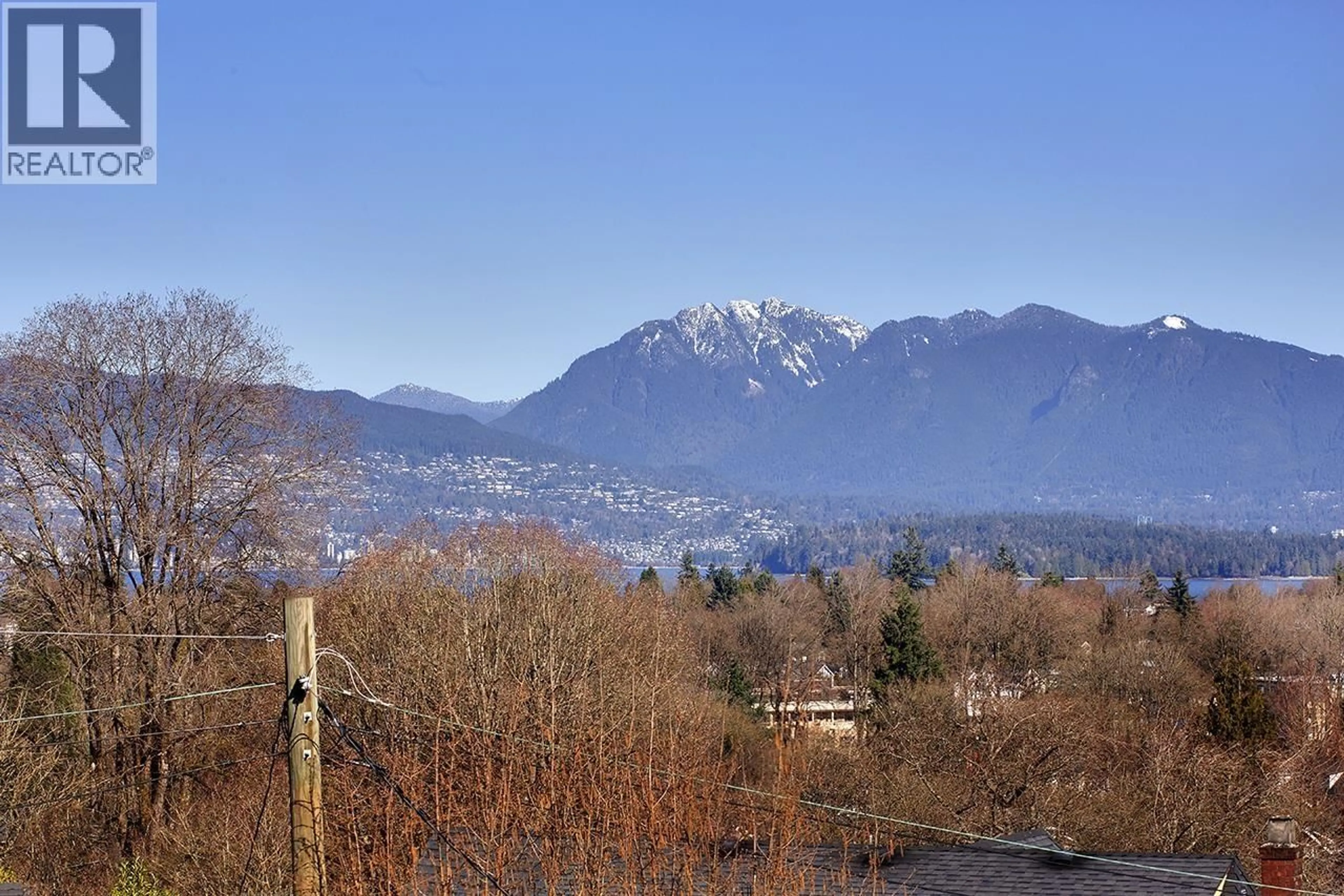 A pic from outside/outdoor area/front of a property/back of a property/a pic from drone, mountain view for 3657 14TH AVENUE, Vancouver British Columbia V6R2W6