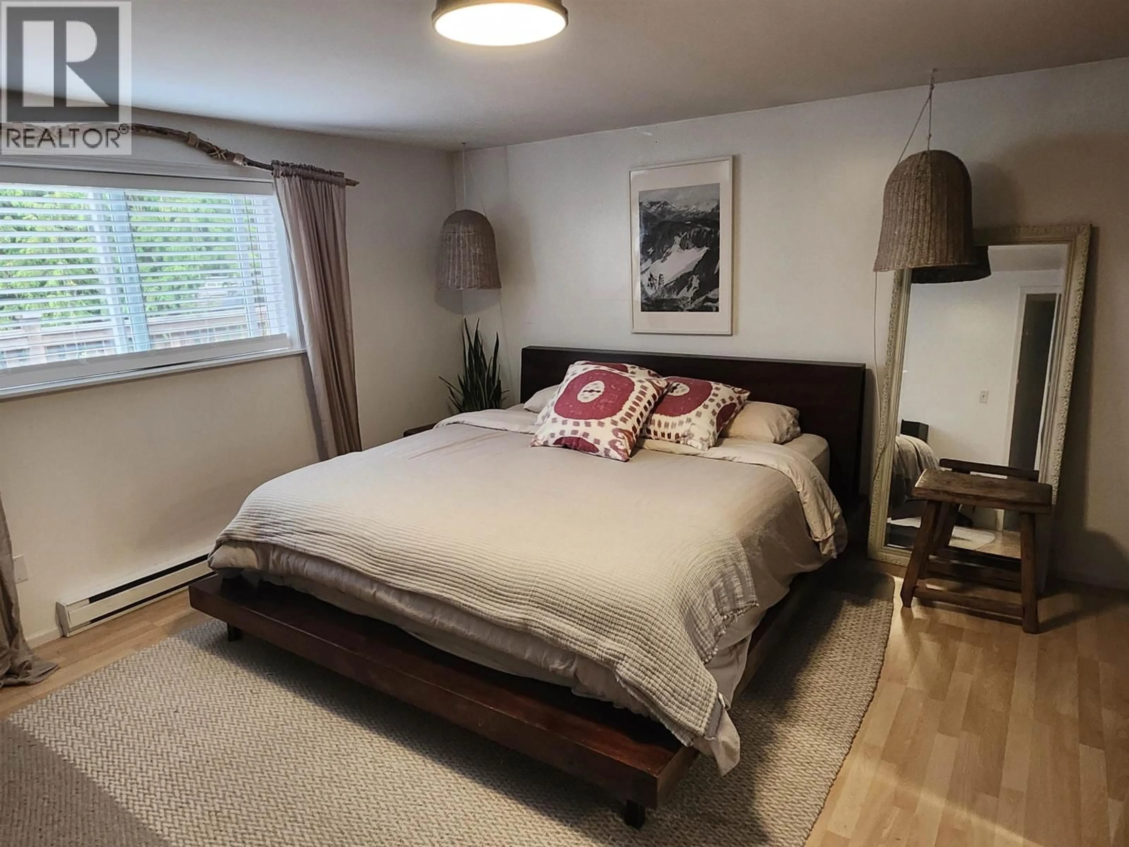 Bedroom with bed, wood/laminate floor for 14848 SQUAMISH VALLEY ROAD, Squamish British Columbia V0N1H0