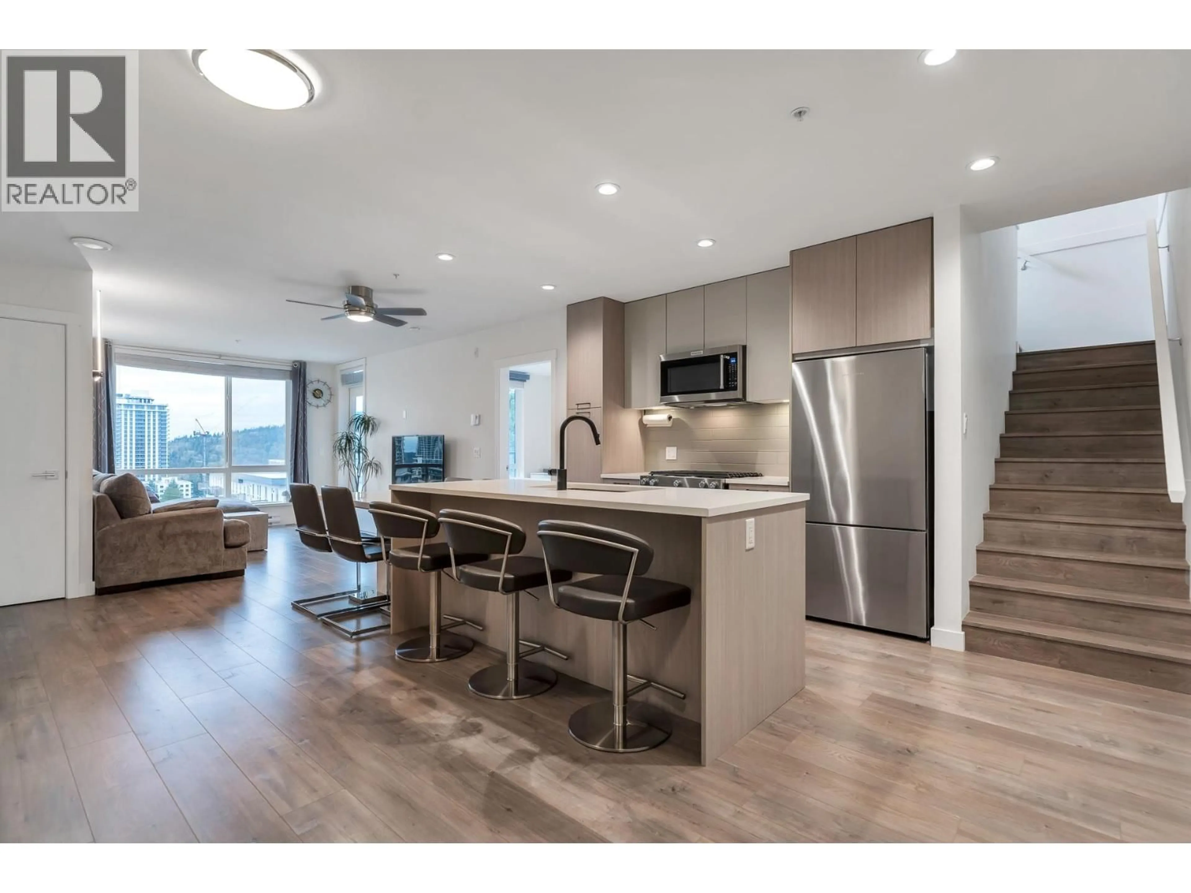 Open concept kitchen, wood/laminate floor for 611 - 707 COMO LAKE AVENUE, Coquitlam British Columbia V3J0J5