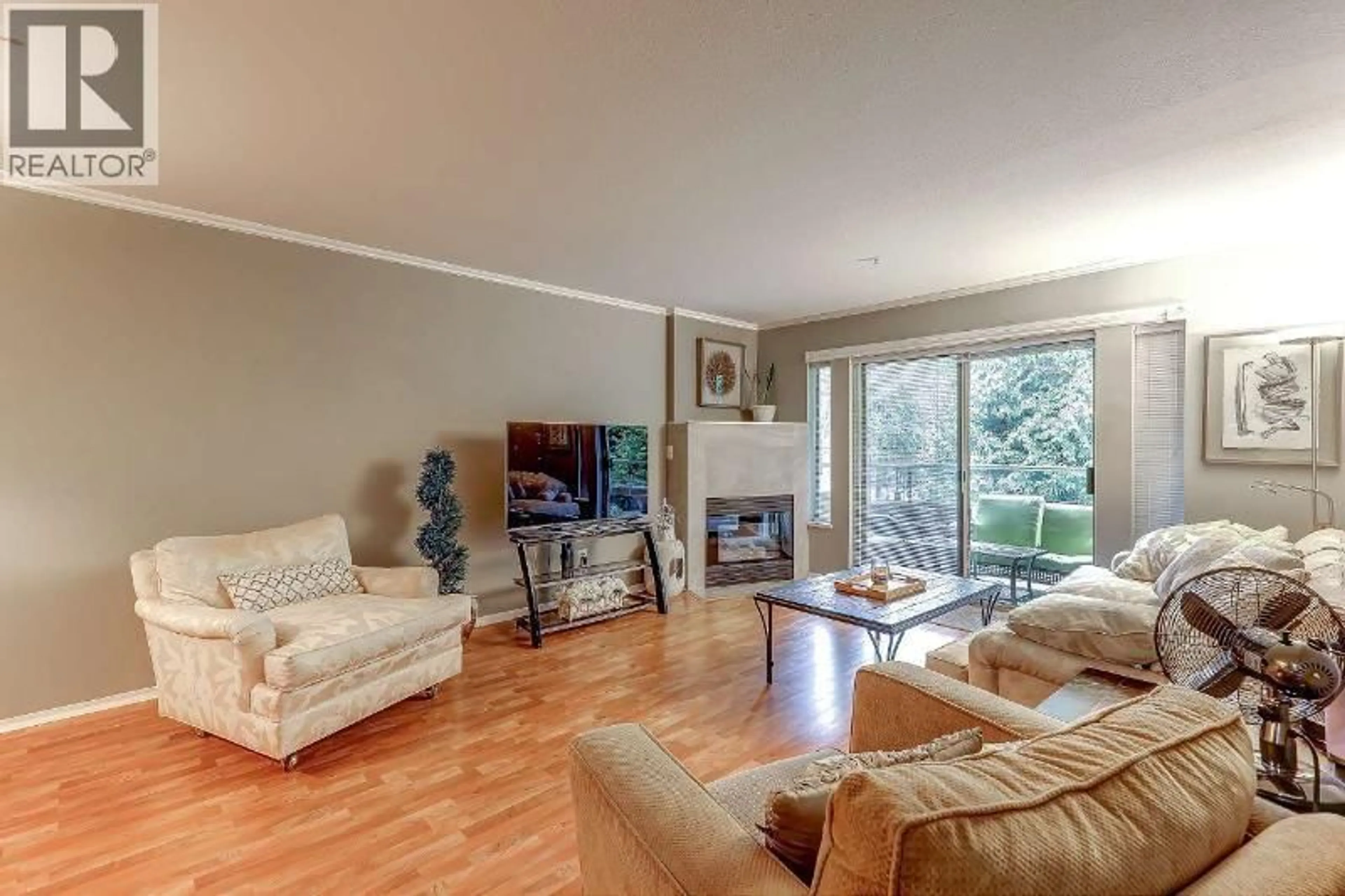 Living room with furniture, wood/laminate floor for 206 - 19241 FORD ROAD, Pitt Meadows British Columbia V3Y2N4
