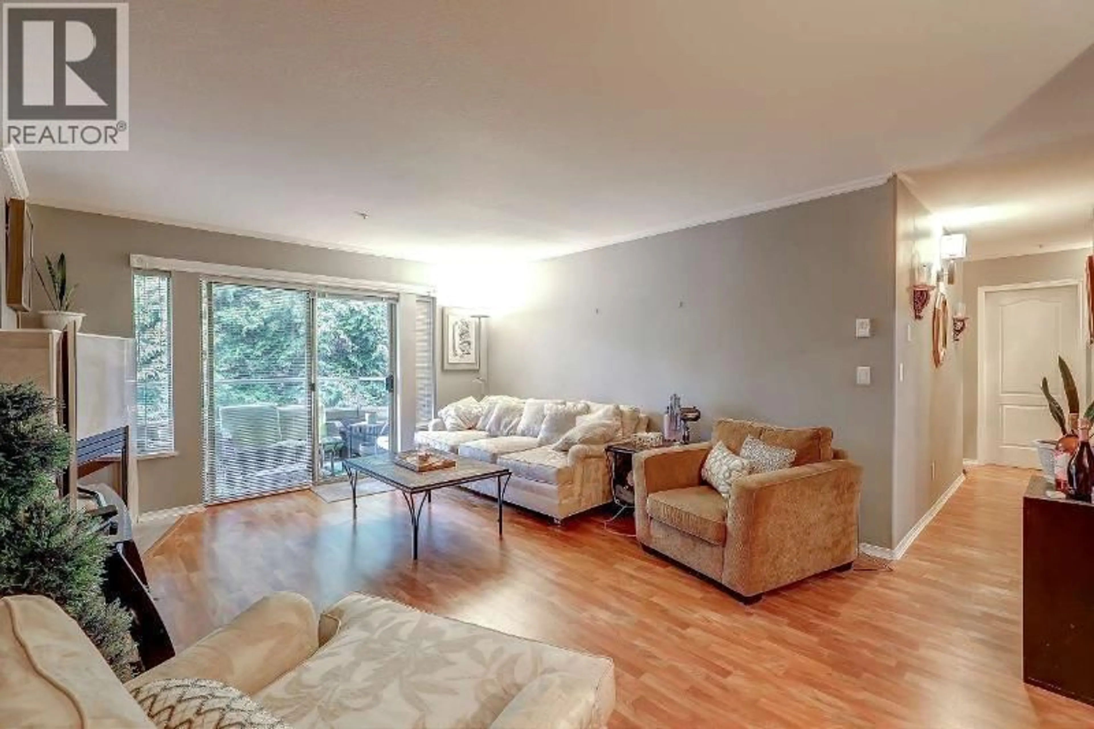 Living room with furniture, wood/laminate floor for 206 - 19241 FORD ROAD, Pitt Meadows British Columbia V3Y2N4