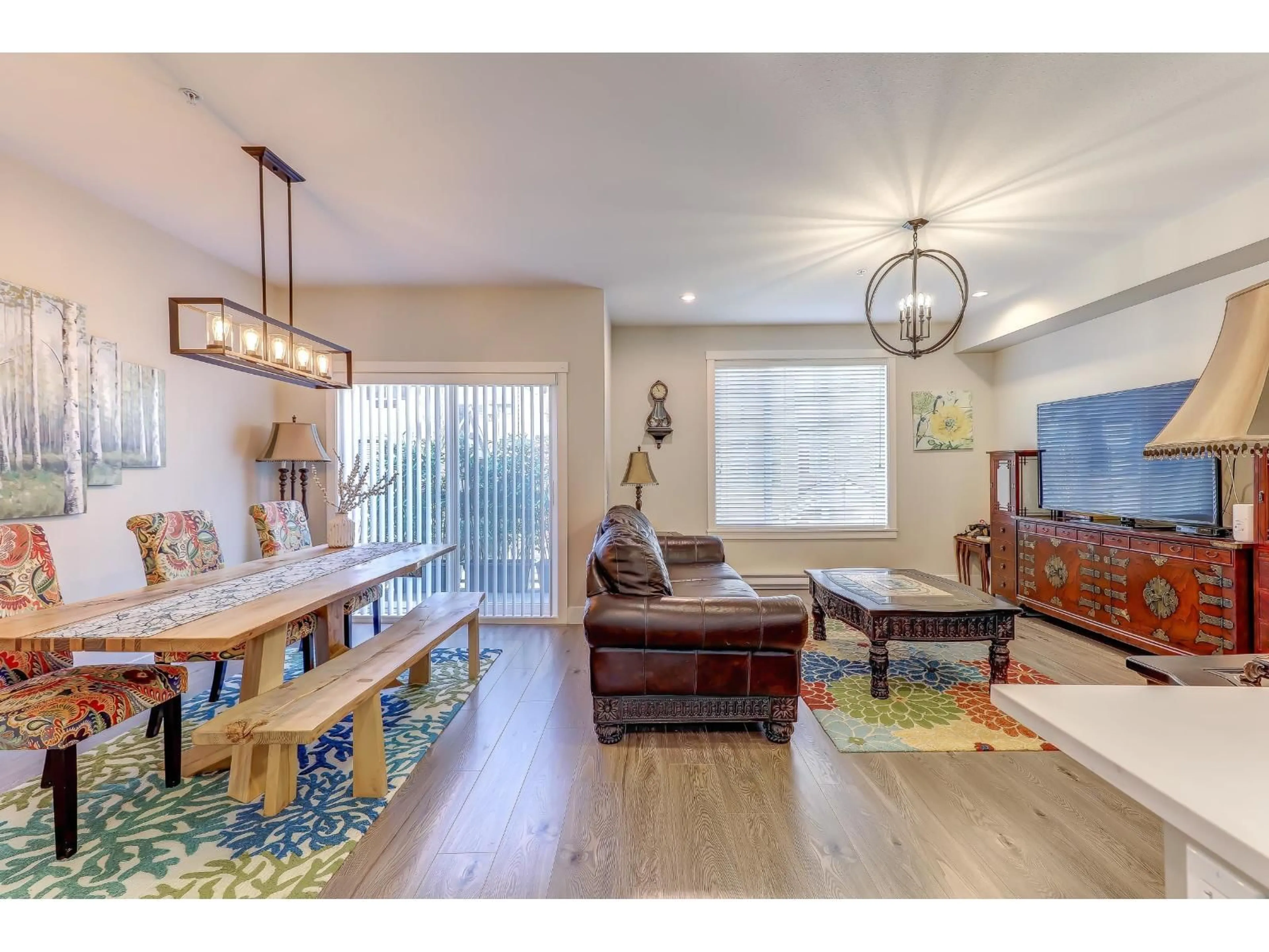 Living room with furniture, wood/laminate floor for 73 - 20498 82 AVENUE, Langley British Columbia V2Y0V1