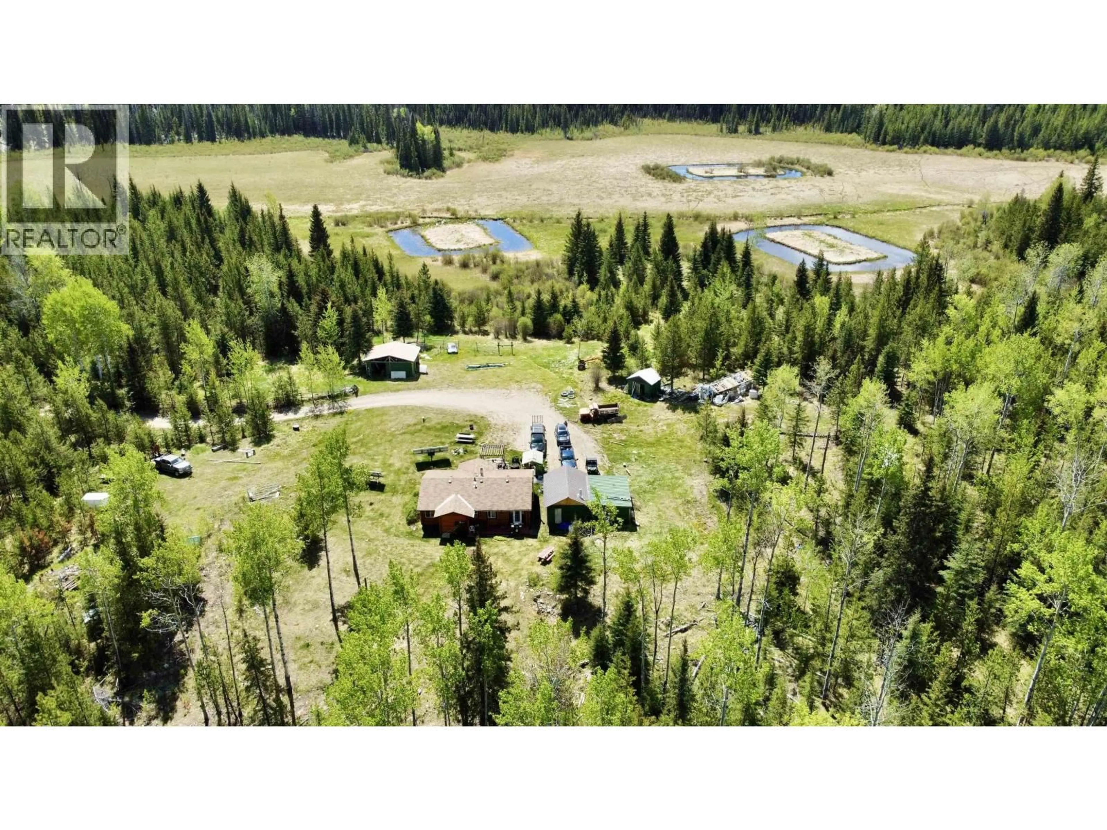 A pic from outside/outdoor area/front of a property/back of a property/a pic from drone, forest/trees view for 7611 NORTH BONAPARTE ROAD, Bridge Lake British Columbia V0K2K2