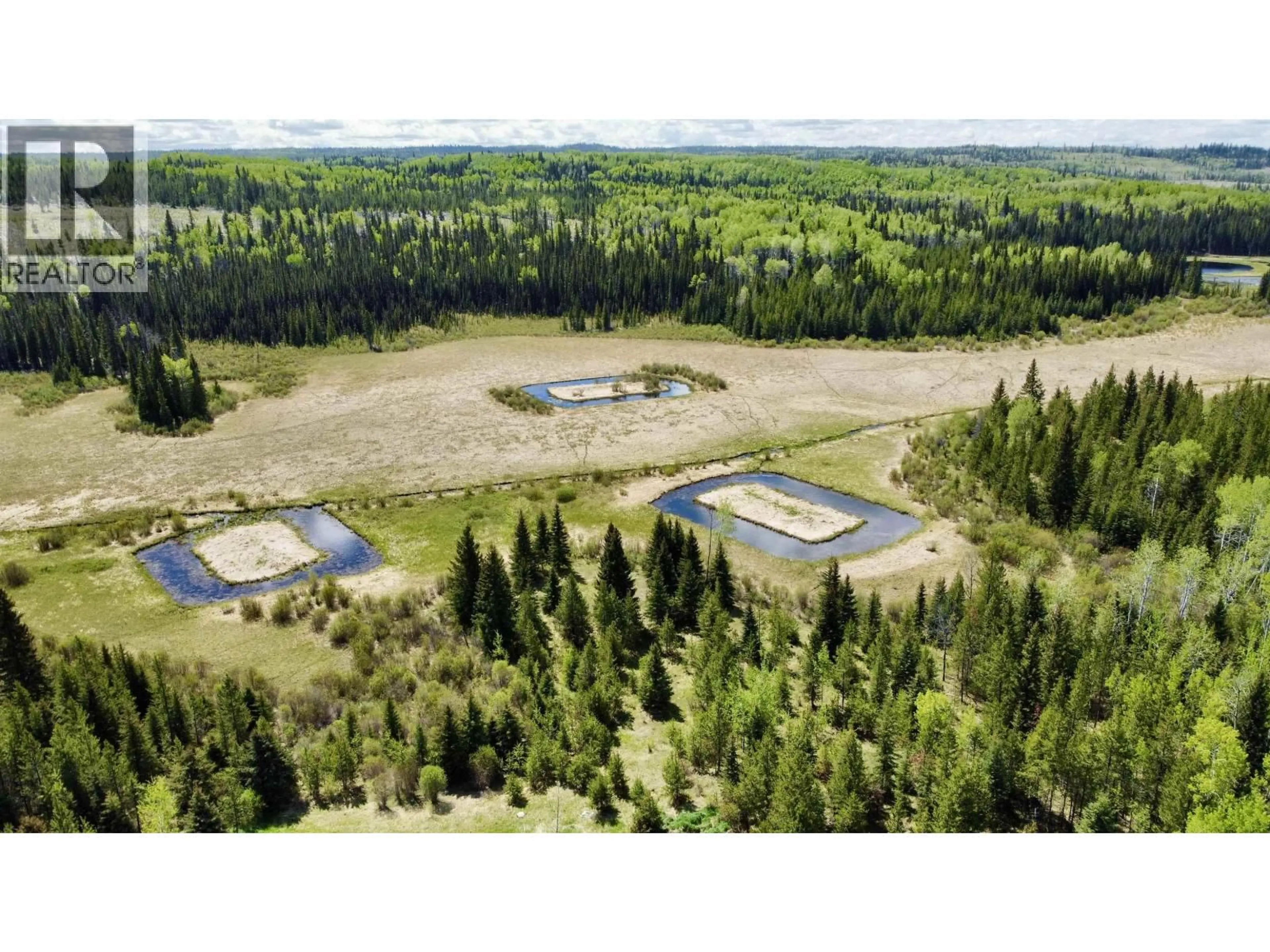 A pic from outside/outdoor area/front of a property/back of a property/a pic from drone, unknown for 7611 NORTH BONAPARTE ROAD, Bridge Lake British Columbia V0K2K2