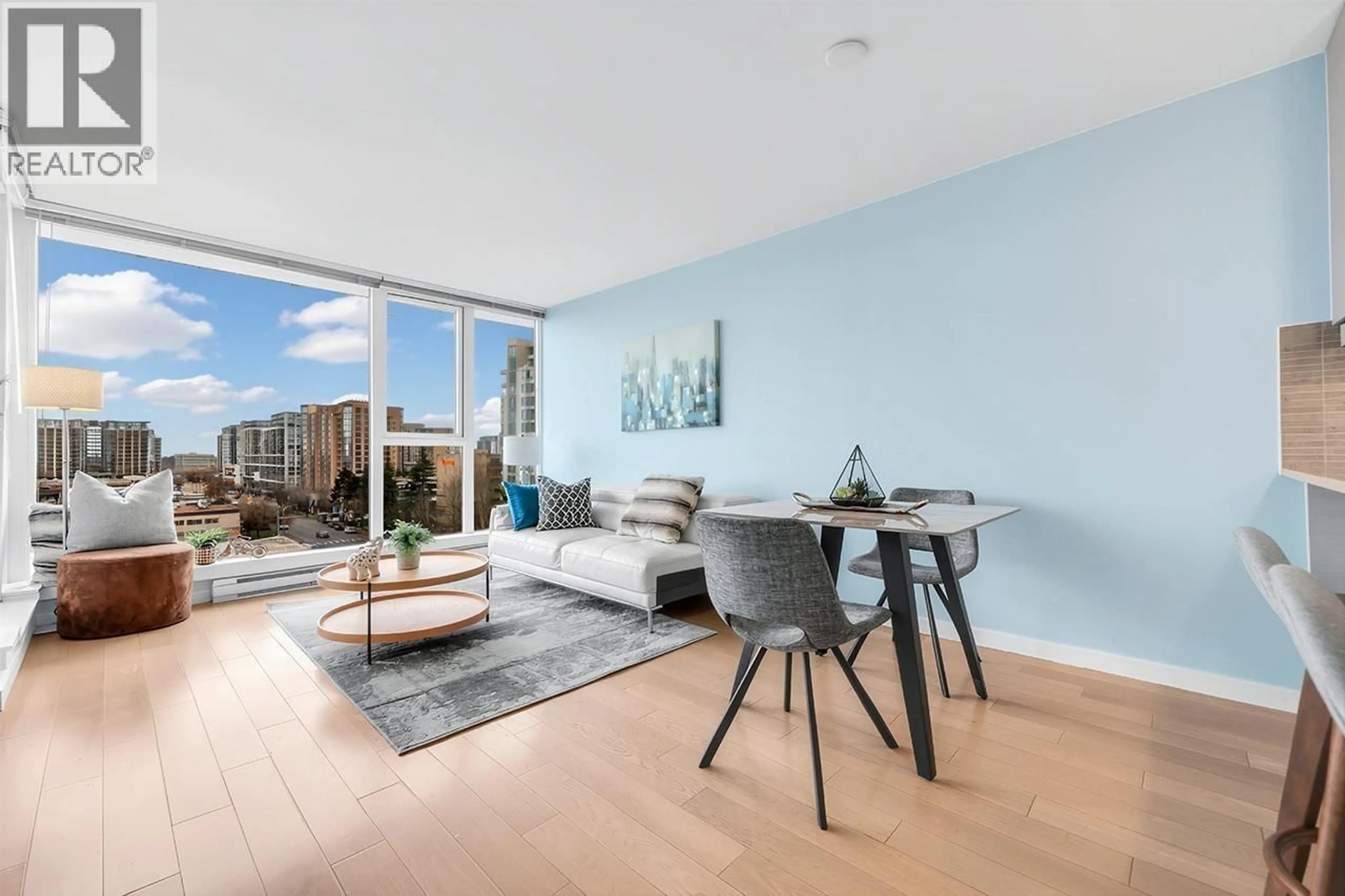 Living room with furniture, wood/laminate floor for 909 - 7117 ELMBRIDGE WAY, Richmond British Columbia V6X0J2