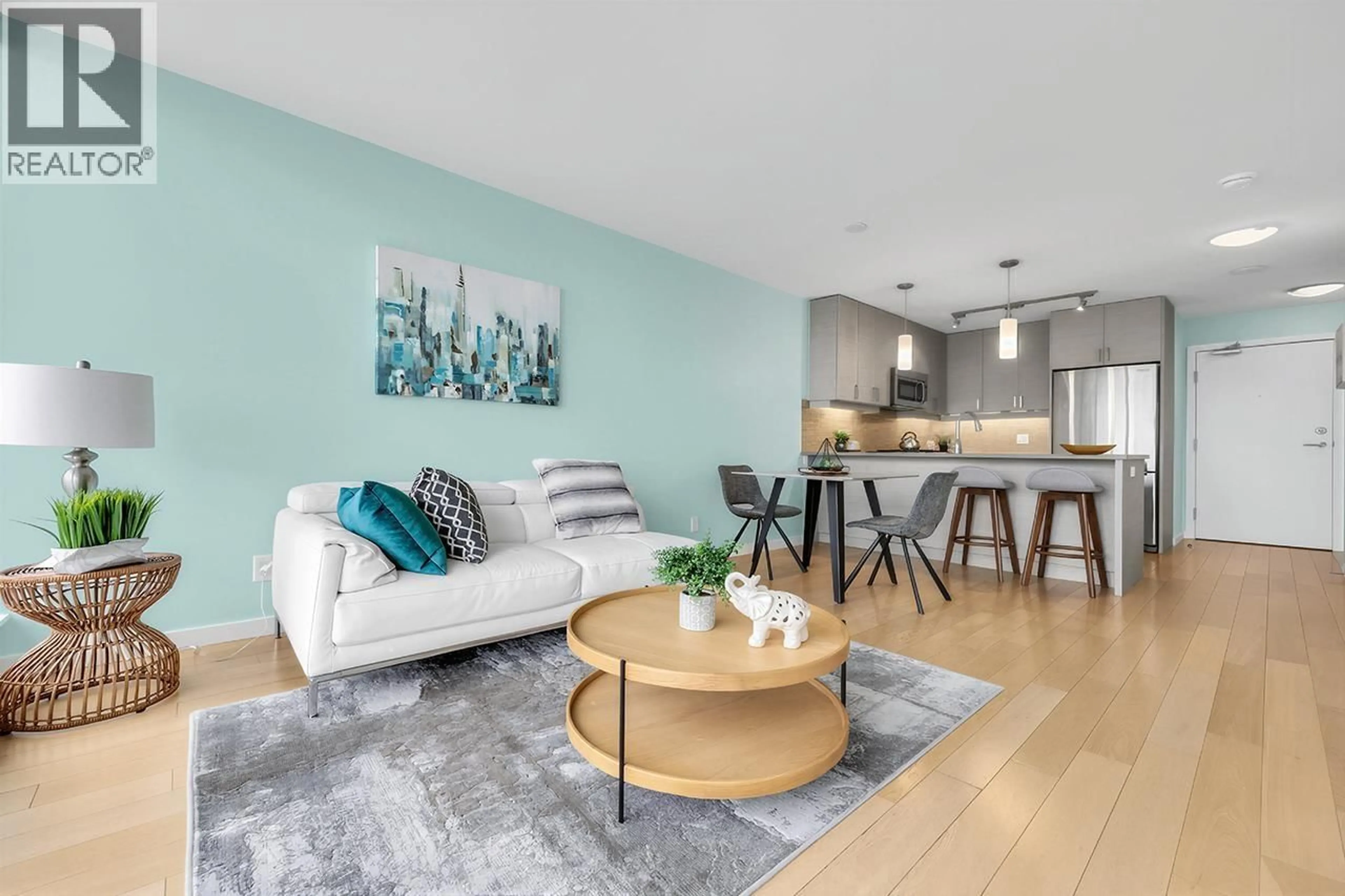 Living room with furniture, wood/laminate floor for 909 - 7117 ELMBRIDGE WAY, Richmond British Columbia V6X0J2