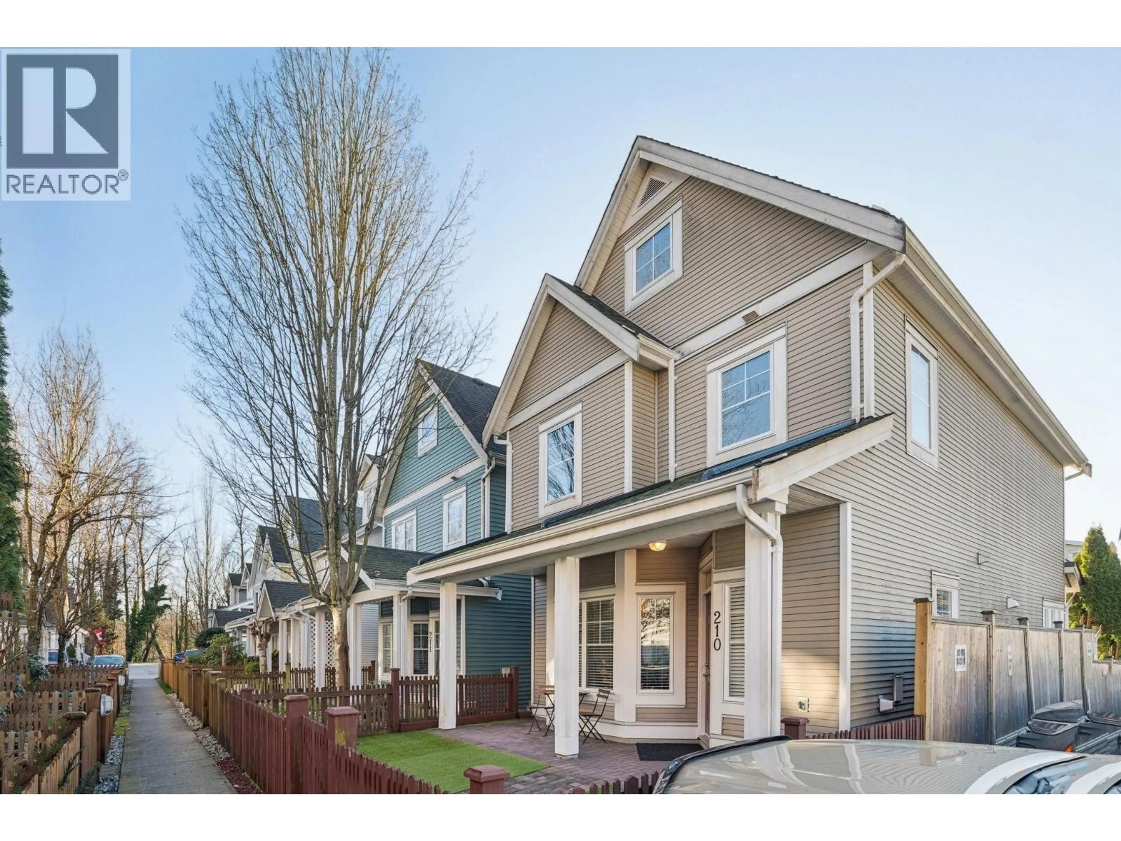 Home with vinyl exterior material, street for 210 - 3000 RIVERBEND DRIVE, Coquitlam British Columbia V3C6R1