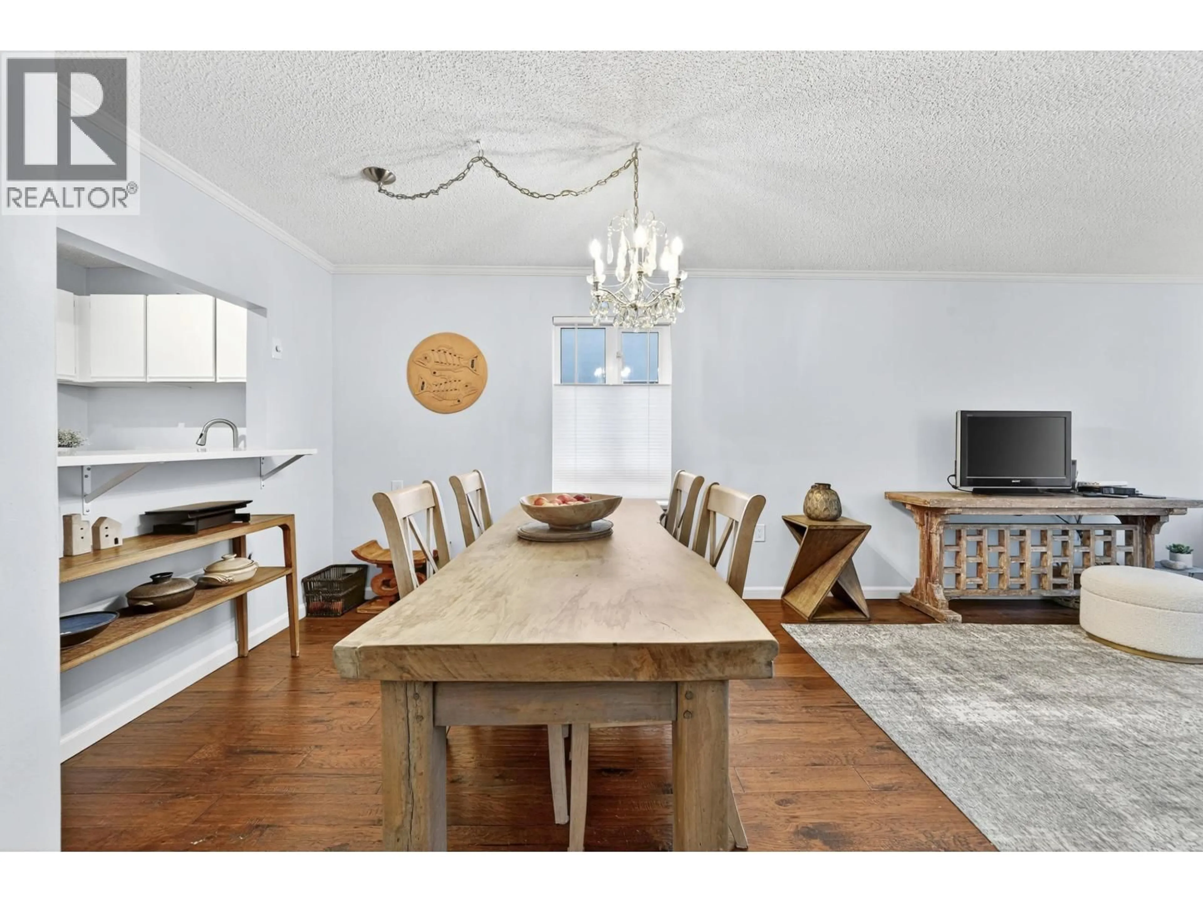Dining room, wood/laminate floor for 104 - 1551 11TH AVENUE, Vancouver British Columbia V6J2B5