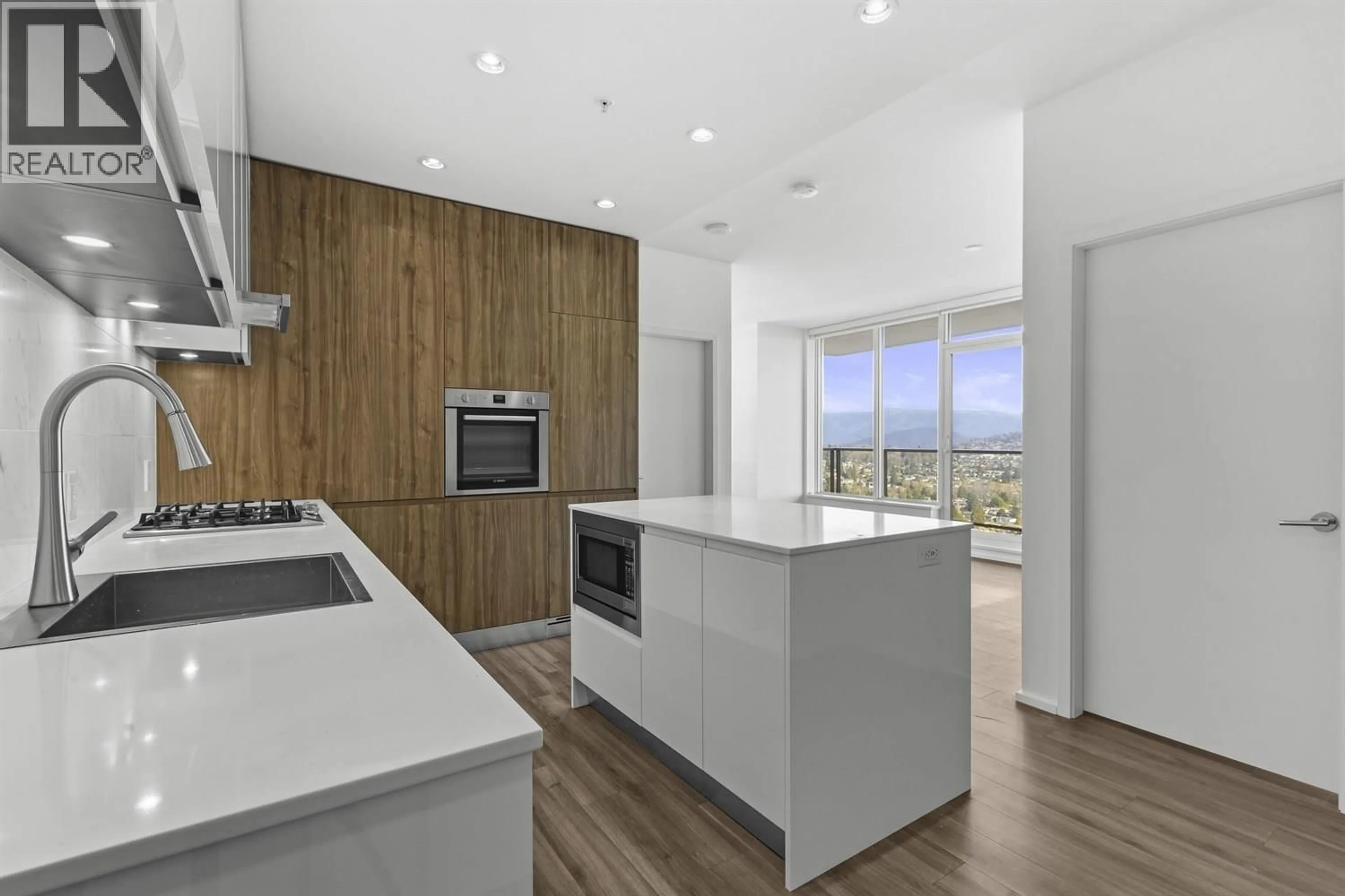 Open concept kitchen, wood/laminate floor for 3311 - 4650 BRENTWOOD BOULEVARD, Burnaby British Columbia V5C0M3