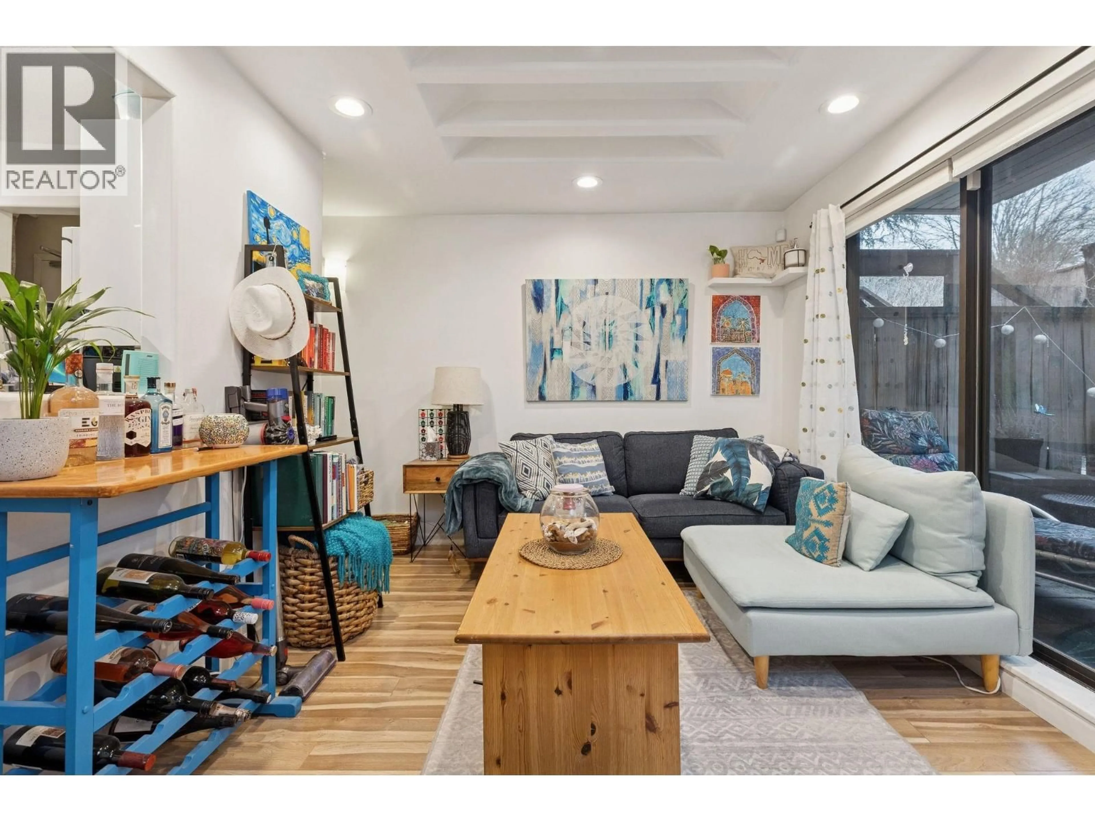 Living room with furniture, wood/laminate floor for 107 - 350 5TH AVENUE, Vancouver British Columbia V5T1H4