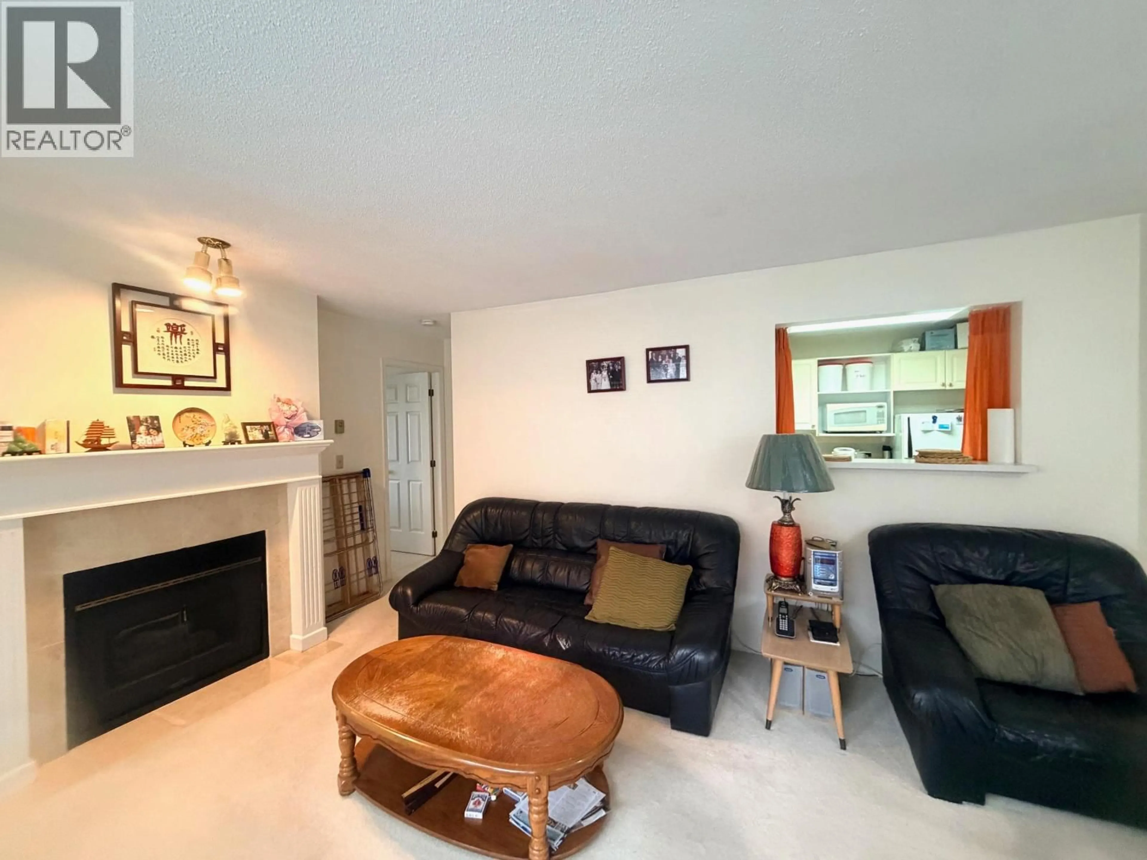 Living room with furniture, unknown for 203 - 5250 VICTORY STREET, Burnaby British Columbia V5J5H2