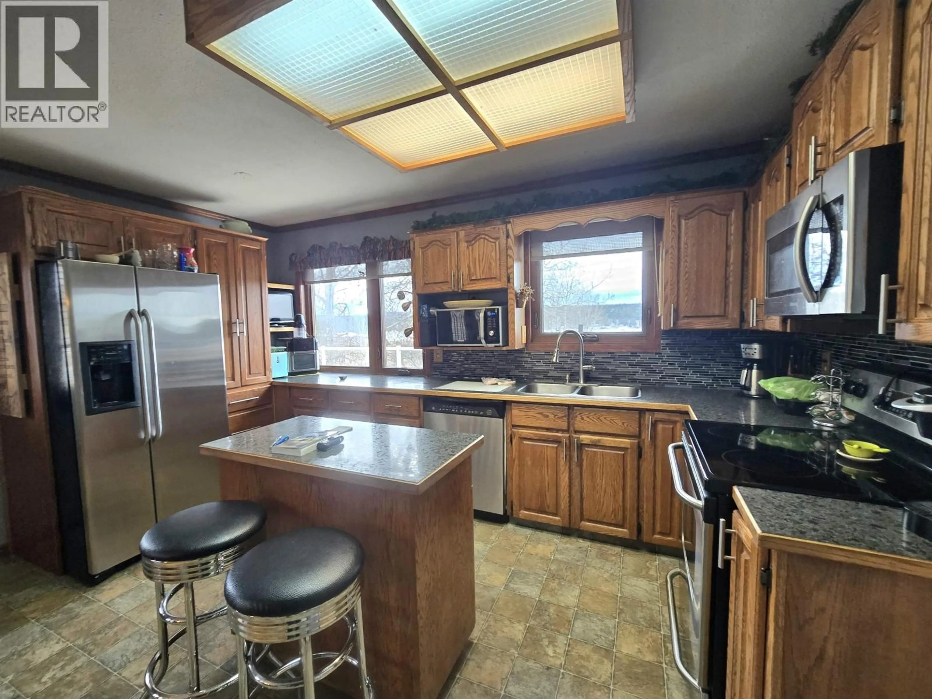 Open concept kitchen, unknown for 6072 LAKESHORE DRIVE, Horse Lake British Columbia V0K2E3
