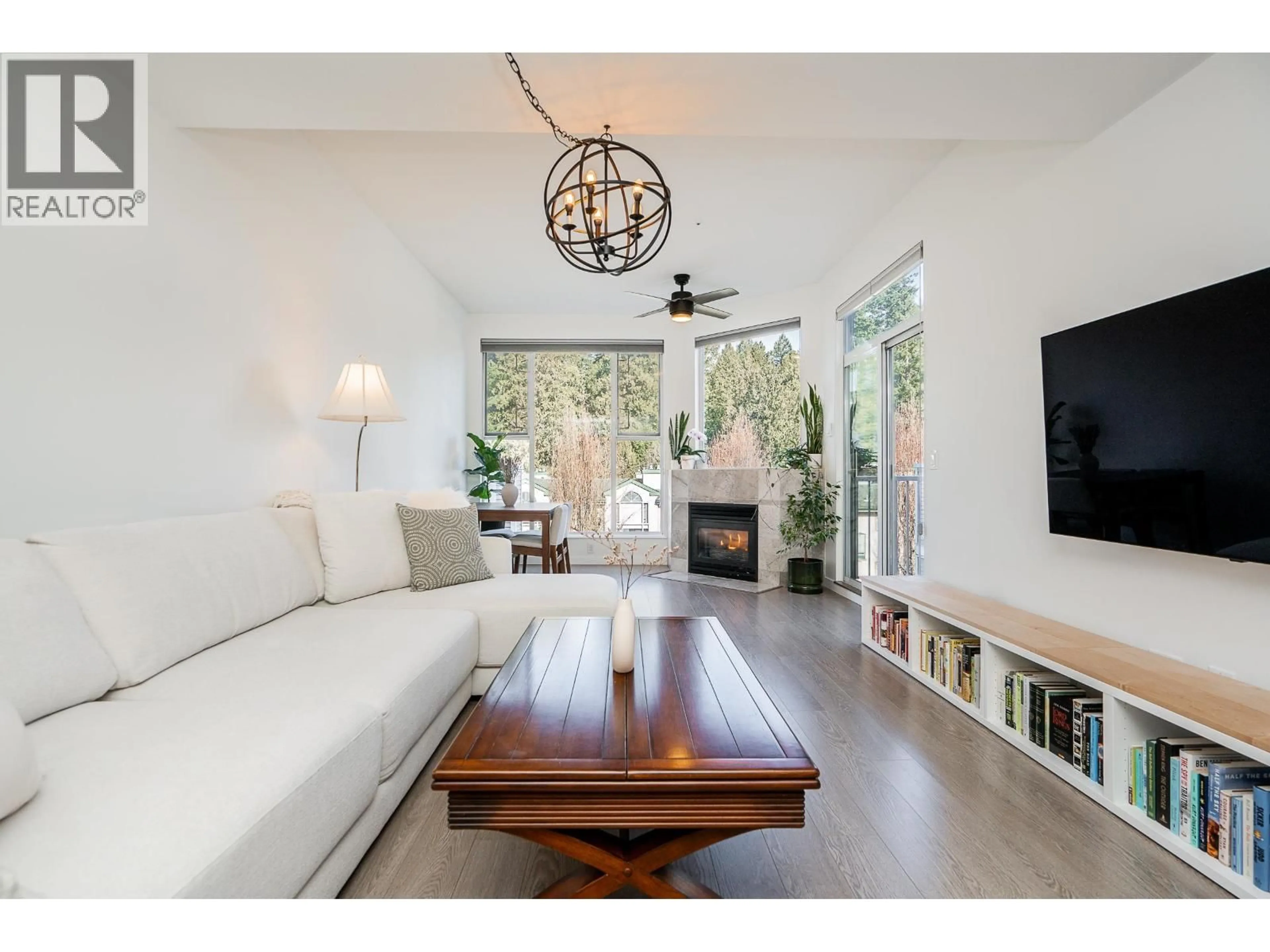 Living room with furniture, wood/laminate floor for 402 - 12155 191B STREET, Pitt Meadows British Columbia V3Y2S2