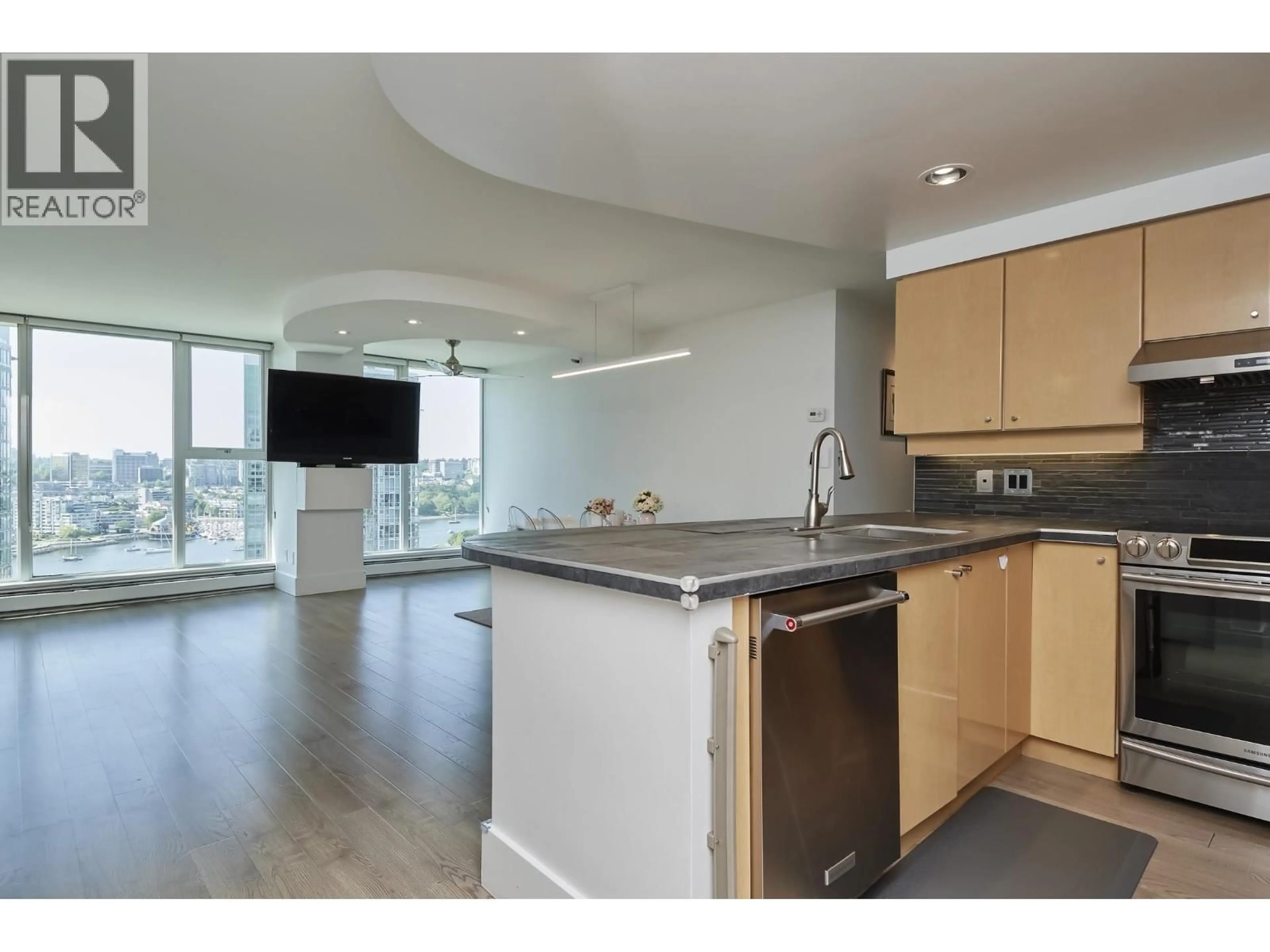 Open concept kitchen, wood/laminate floor for 2005 - 1009 EXPO BOULEVARD, Vancouver British Columbia V6Z2V9