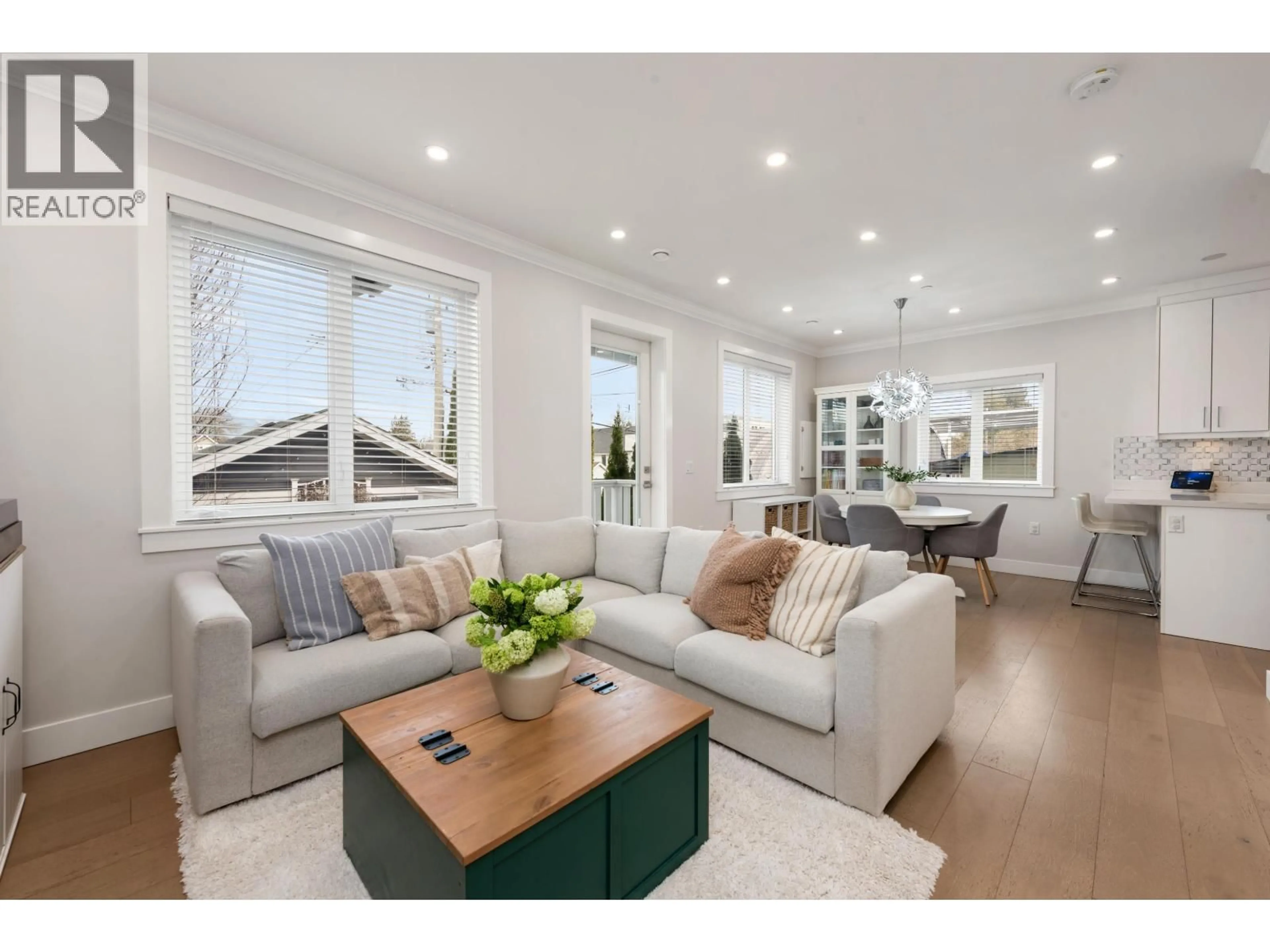 Living room with furniture, wood/laminate floor for 2876 CLARK DRIVE, Vancouver British Columbia V5N0E9
