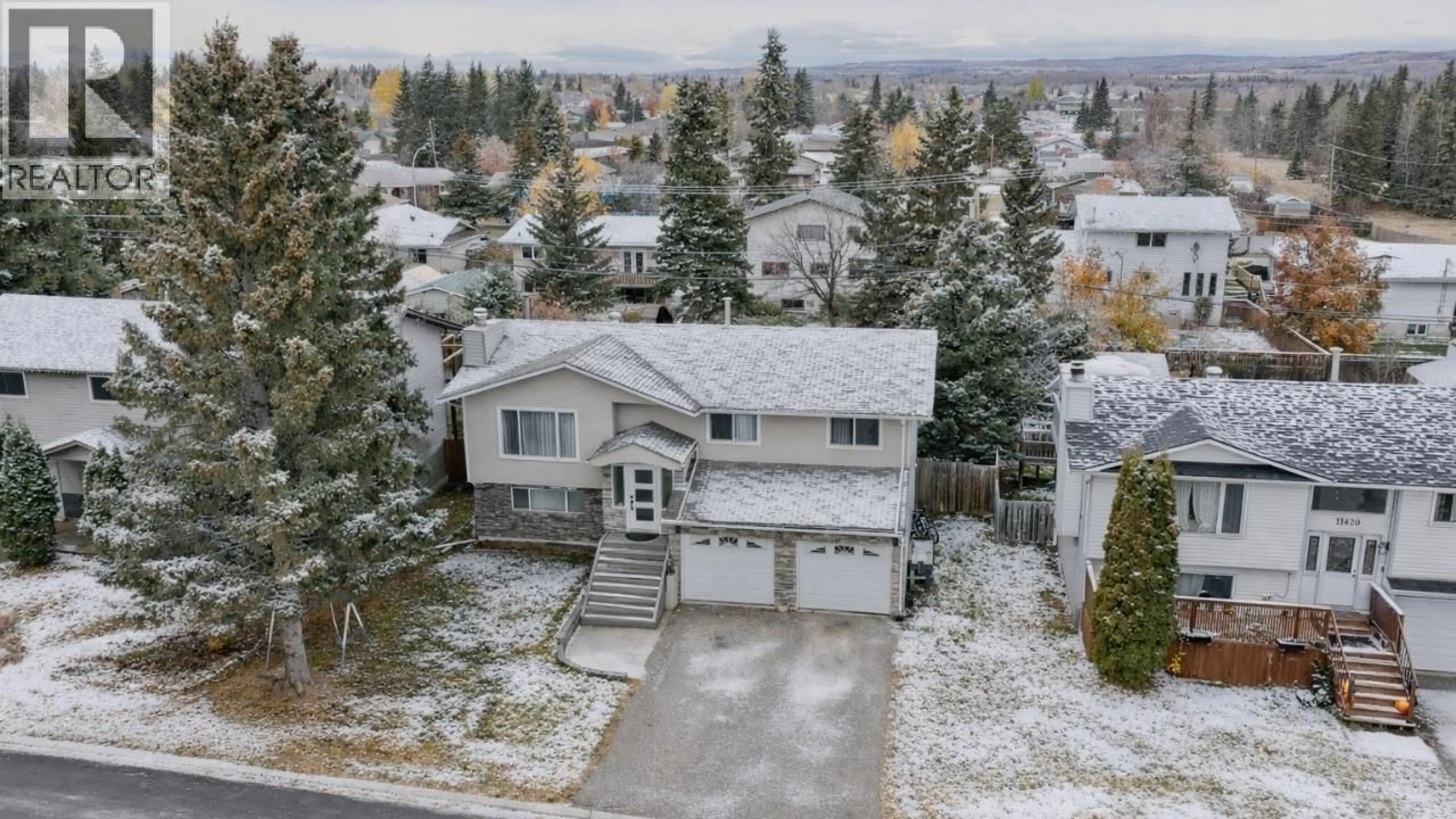 A pic from outside/outdoor area/front of a property/back of a property/a pic from drone, street for 11416 92 STREET, Fort St. John British Columbia V1J4Y3