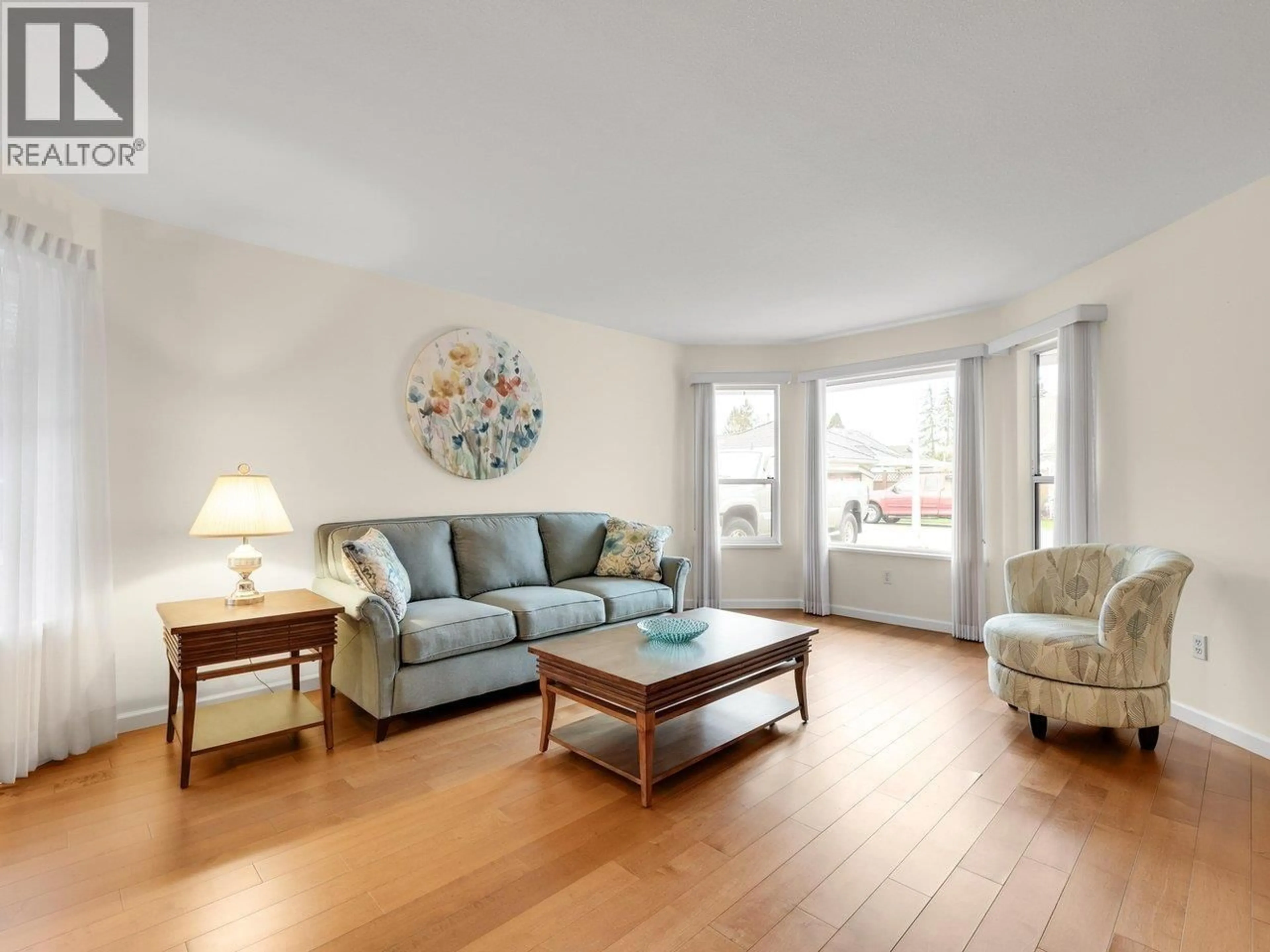 Living room with furniture, wood/laminate floor for 5251 LABURNUM PARK PLACE, Ladner British Columbia V4K4S6