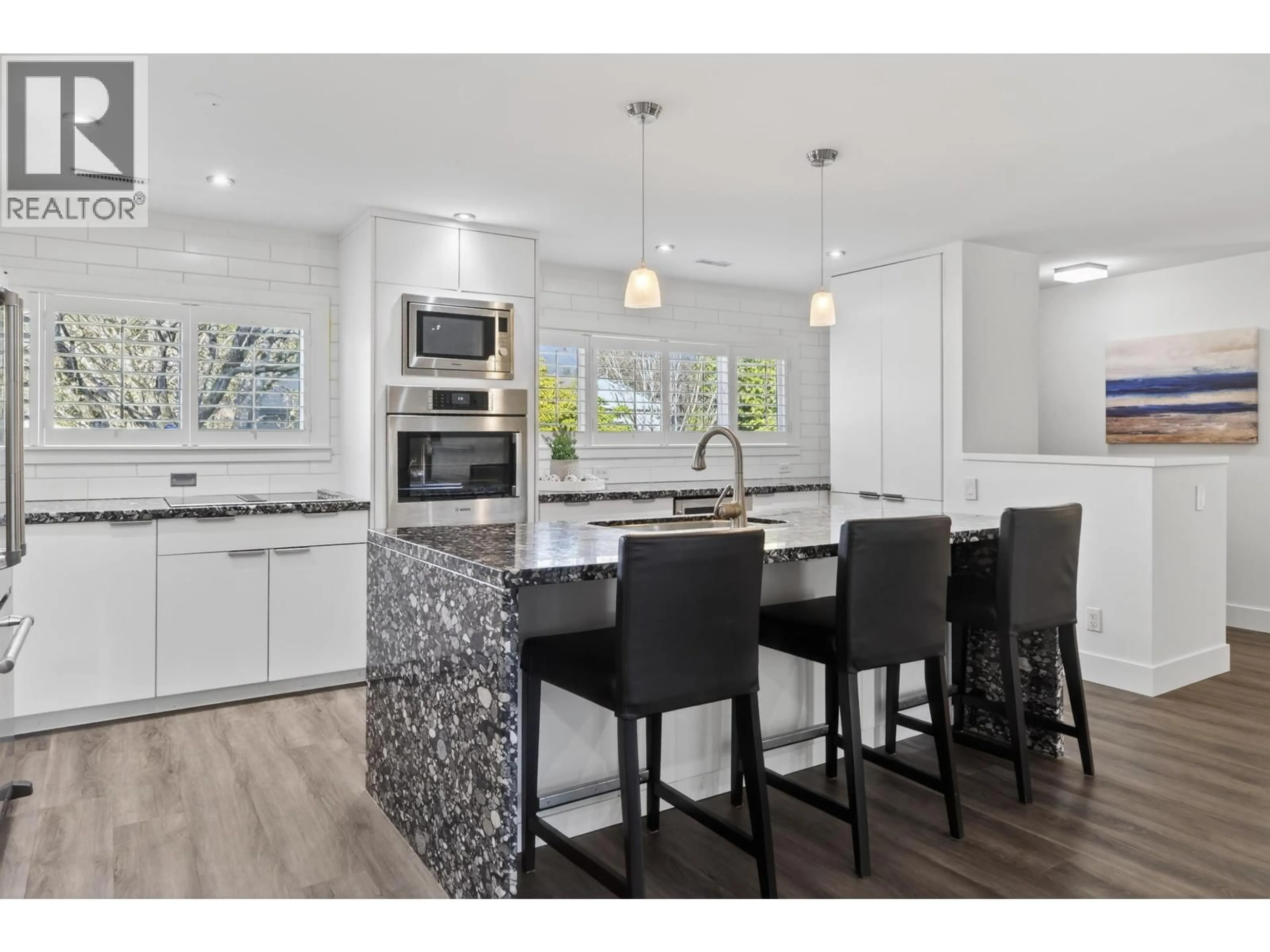 Open concept kitchen, wood/laminate floor for 1375 MCBRIDE STREET, North Vancouver British Columbia V7P1G4