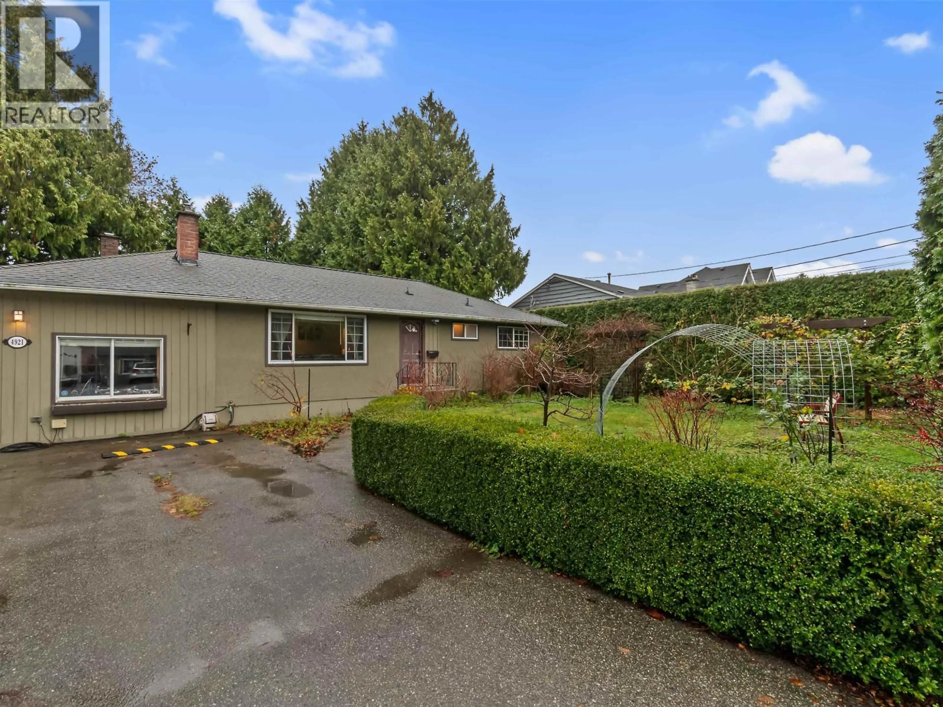 A pic from outside/outdoor area/front of a property/back of a property/a pic from drone, street for 4921 44A AVENUE, Delta British Columbia V4K1E6