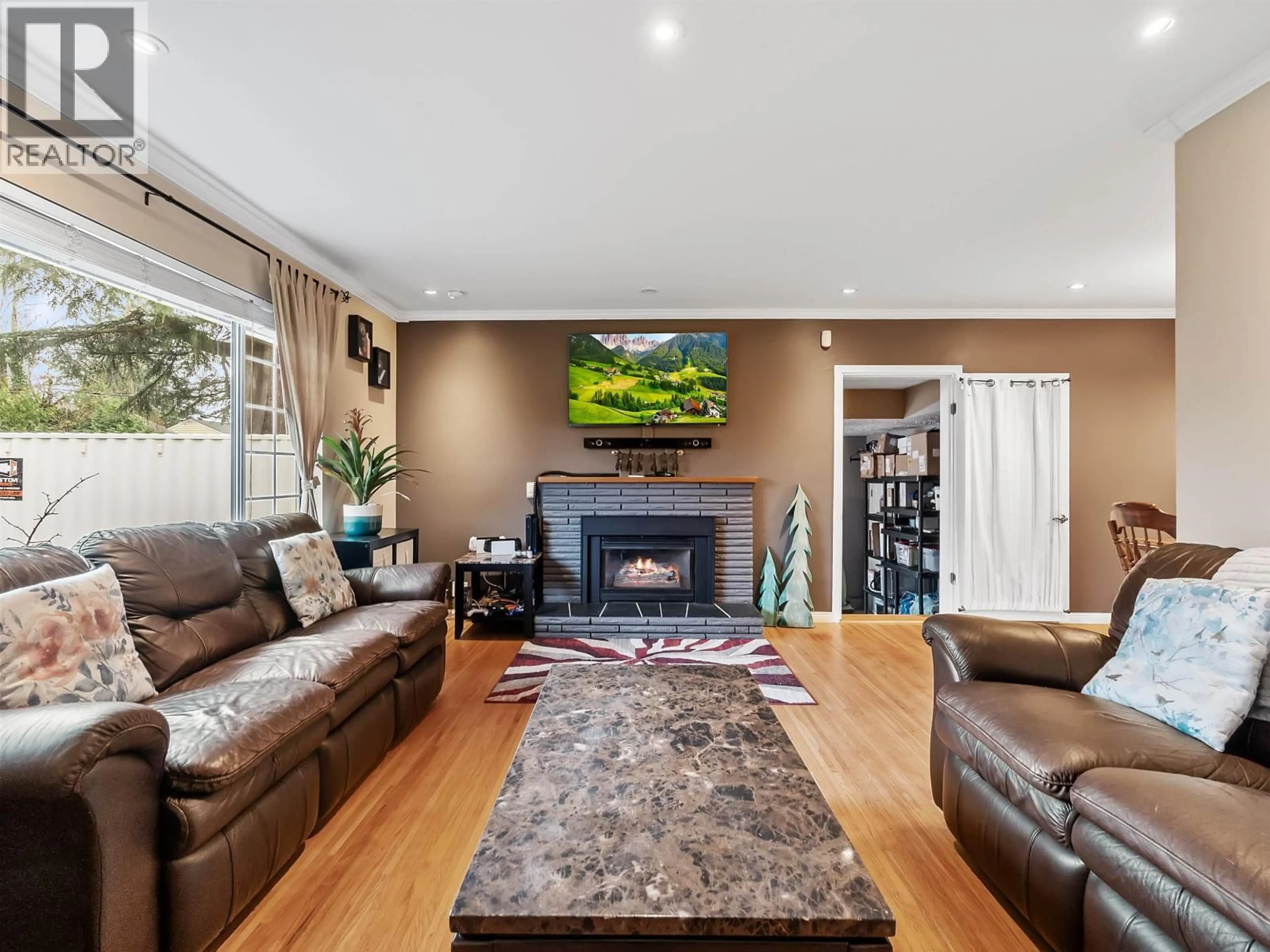 Living room with furniture, wood/laminate floor for 4921 44A AVENUE, Delta British Columbia V4K1E6