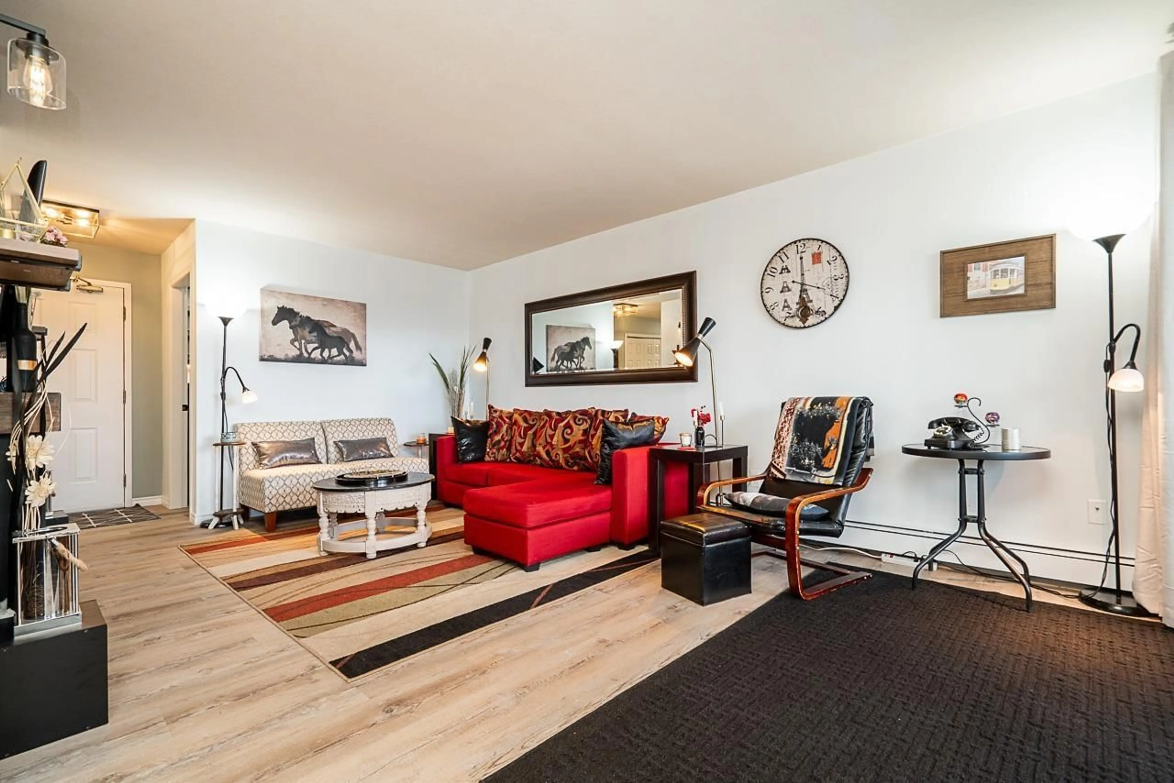 Living room with furniture, wood/laminate floor for 306 - 32823 LANDEAU PLACE, Abbotsford British Columbia V2S6S6