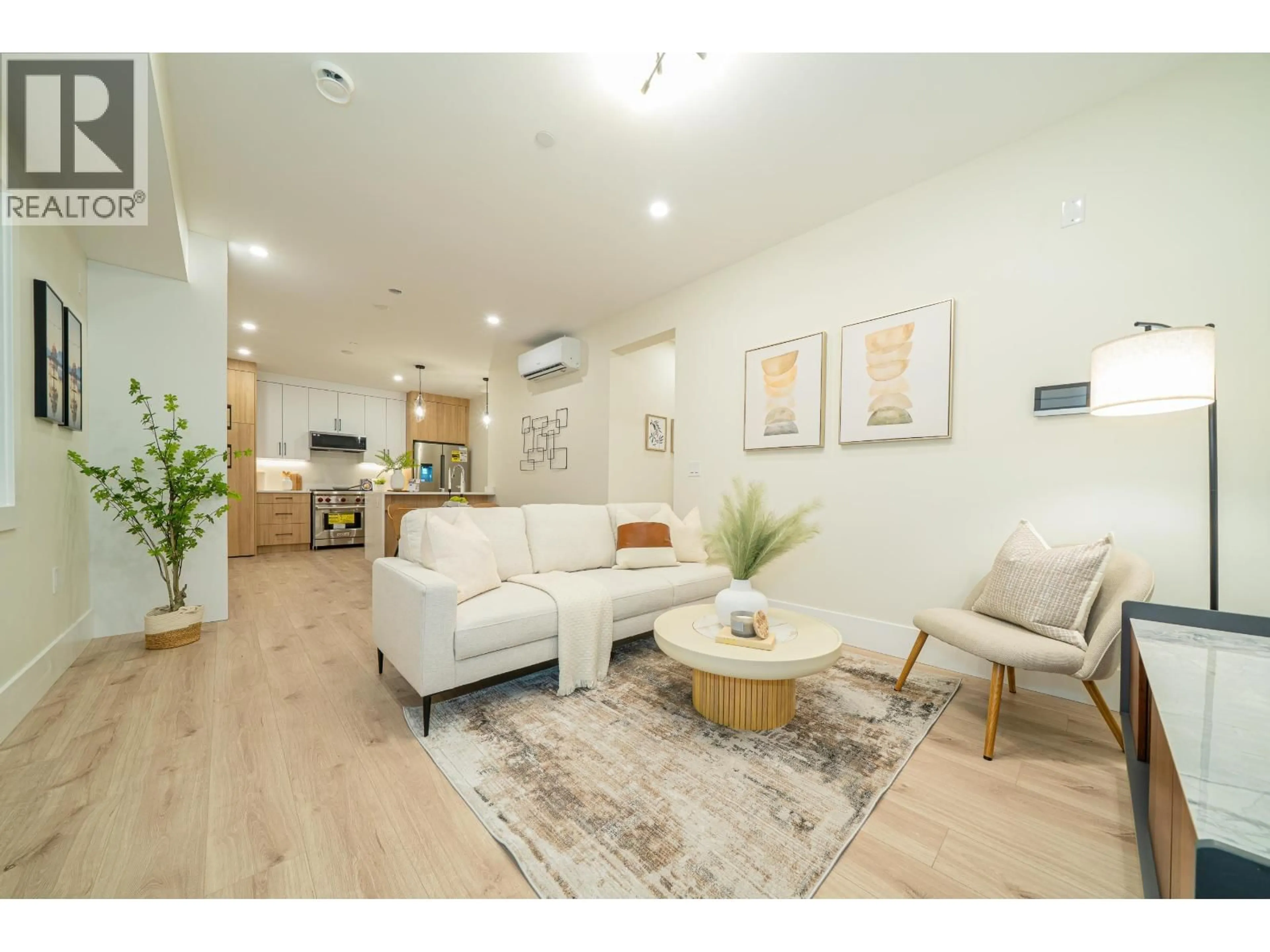 Living room with furniture, wood/laminate floor for 7813 SHAUGHNESSY STREET, Vancouver British Columbia V6P3X7