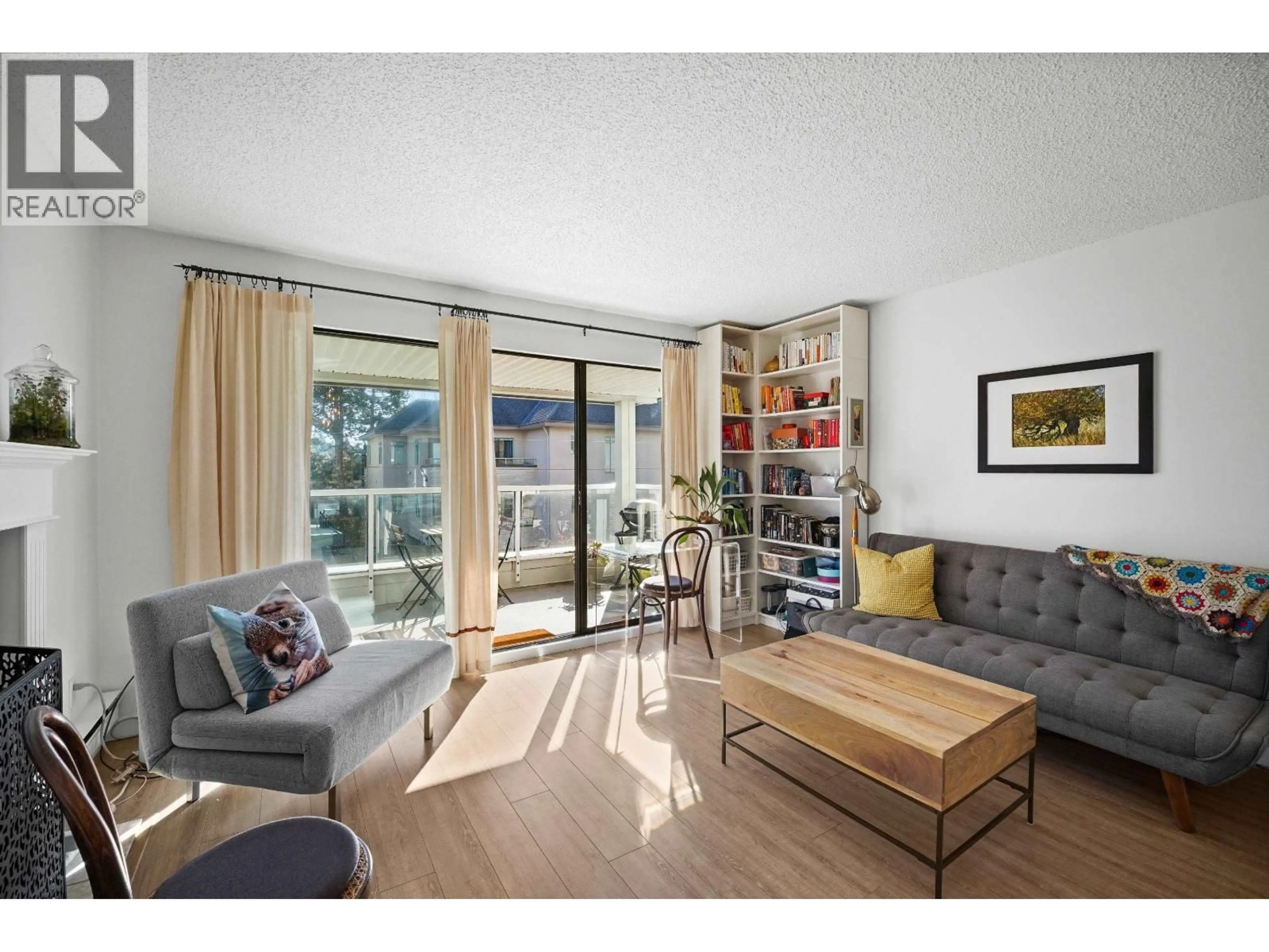 Living room with furniture, wood/laminate floor for 301 - 674 17TH AVENUE, Vancouver British Columbia V5Z1T8