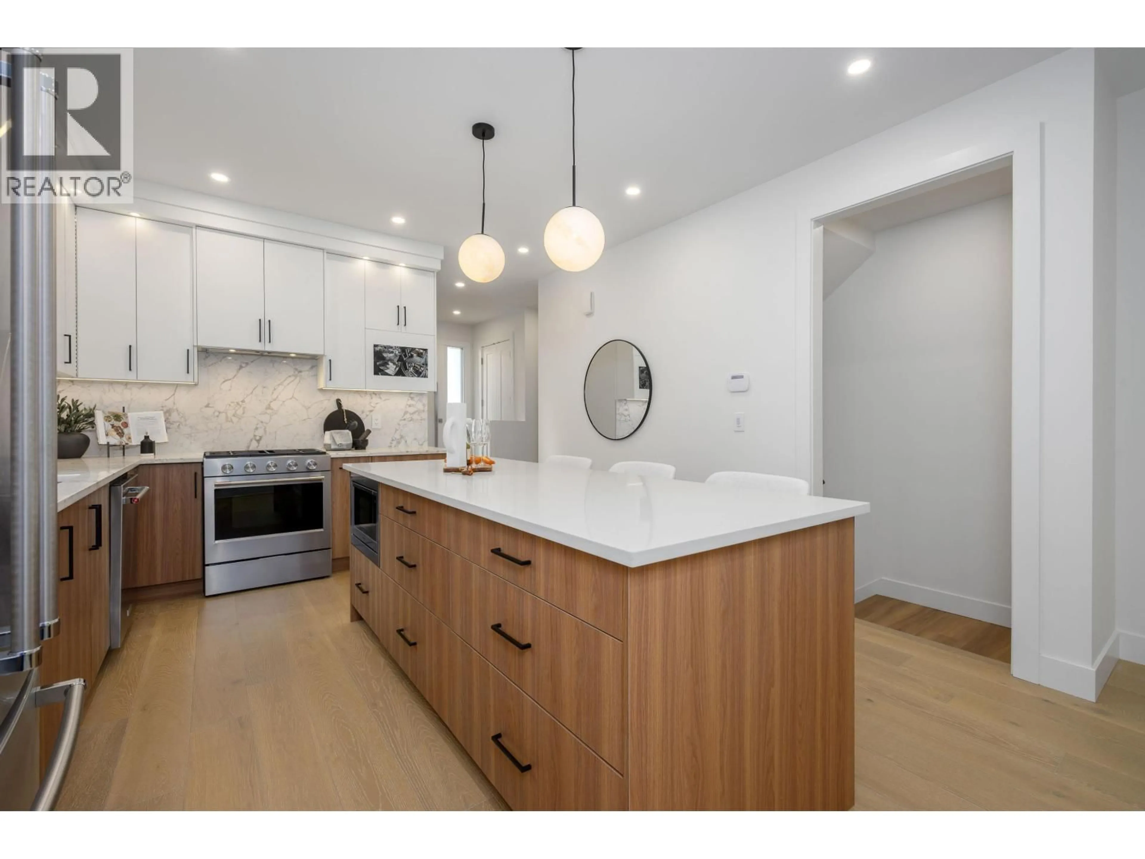 Open concept kitchen, wood/laminate floor for 4 - 6176 ELGIN AVENUE, Burnaby British Columbia V5H3S4