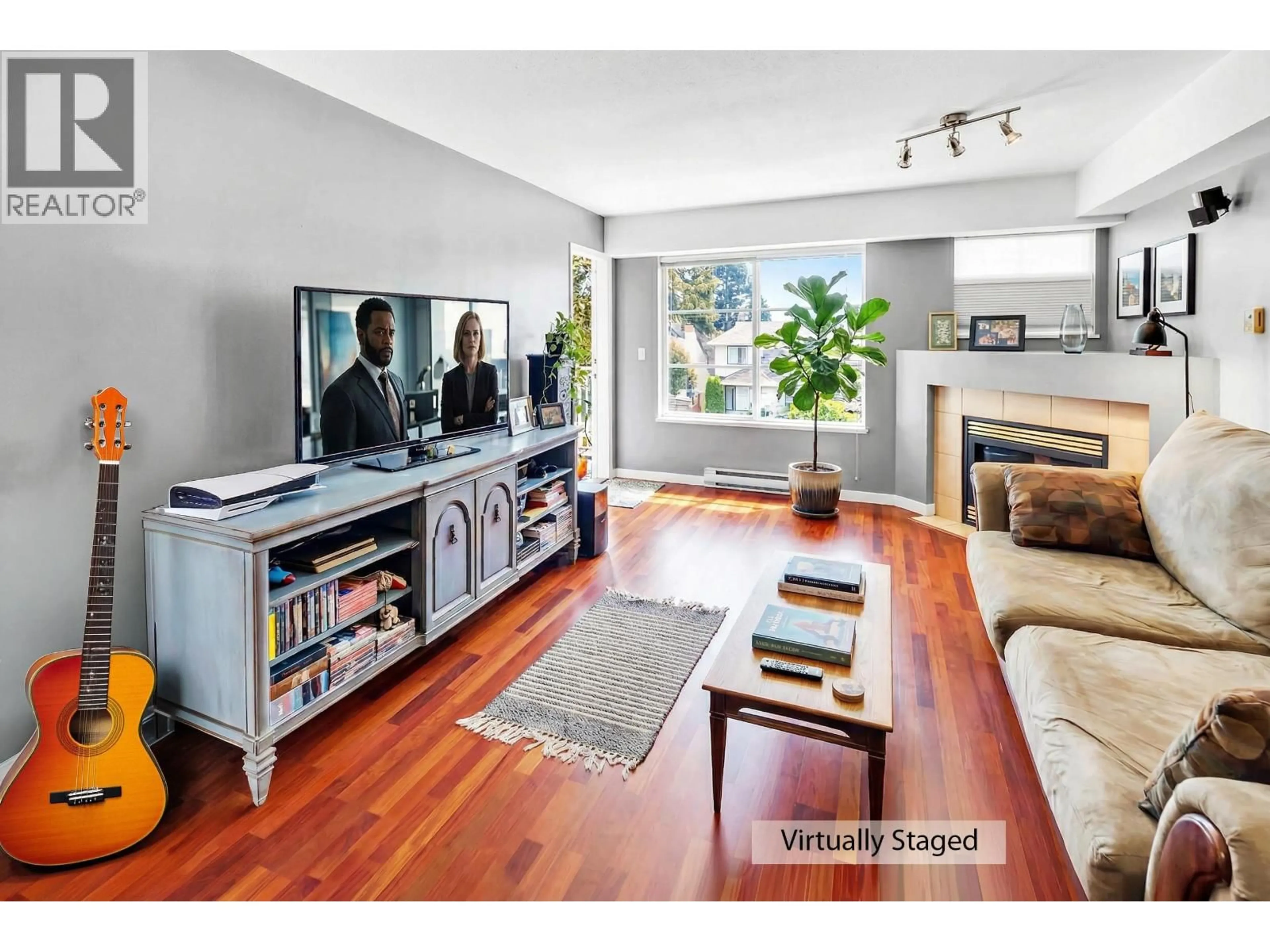 Living room with furniture, wood/laminate floor for 312 - 11519 BURNETT STREET, Maple Ridge British Columbia V2S6J9