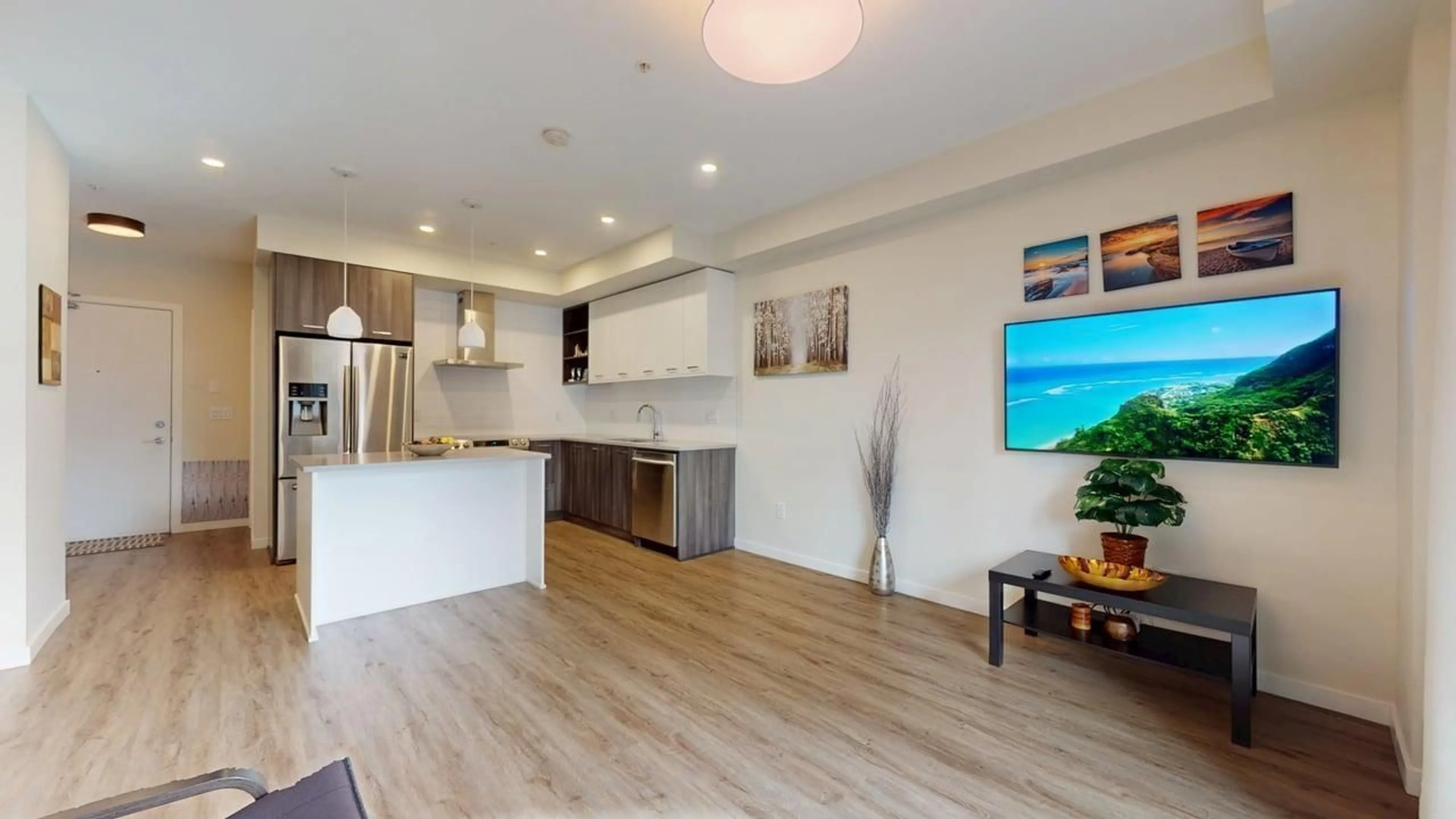 Open concept kitchen, wood/laminate floor for A210 - 20087 68 AVENUE, Langley British Columbia V2Y3H9