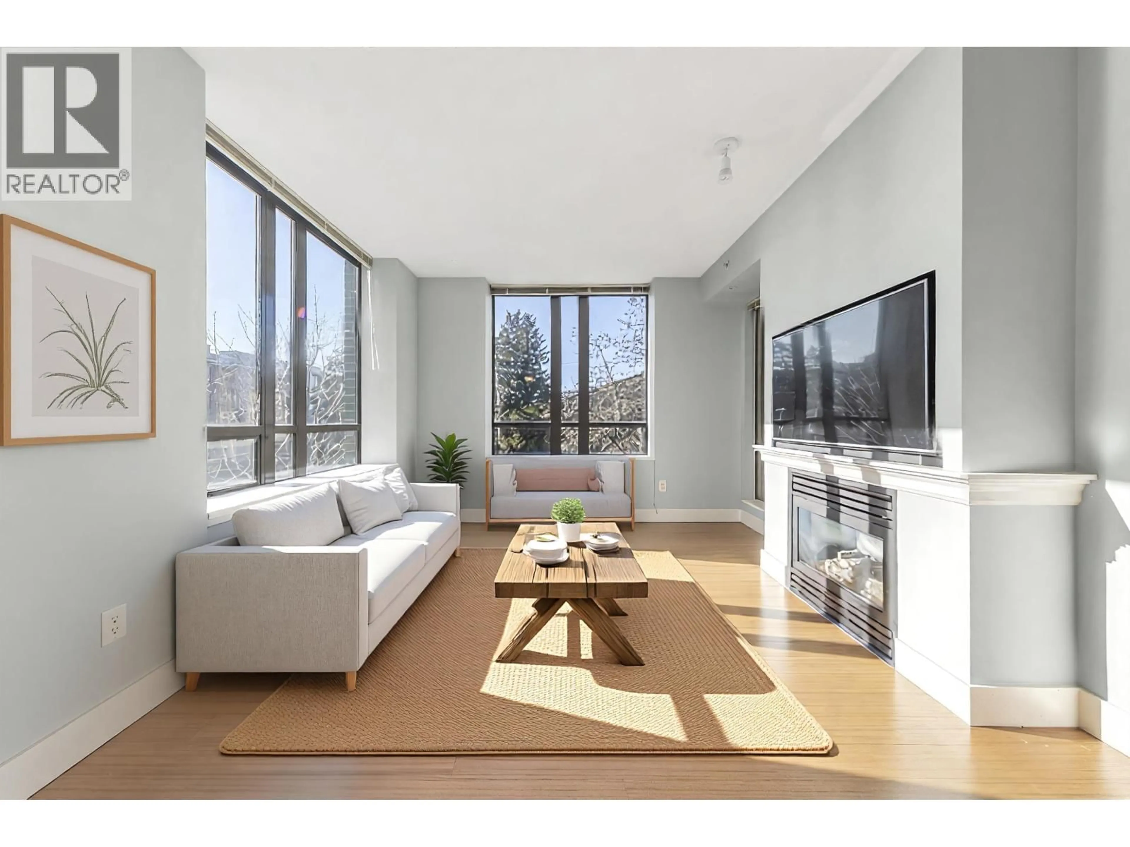 Living room with furniture, unknown for 312 - 170 1ST STREET, North Vancouver British Columbia V7M3P2