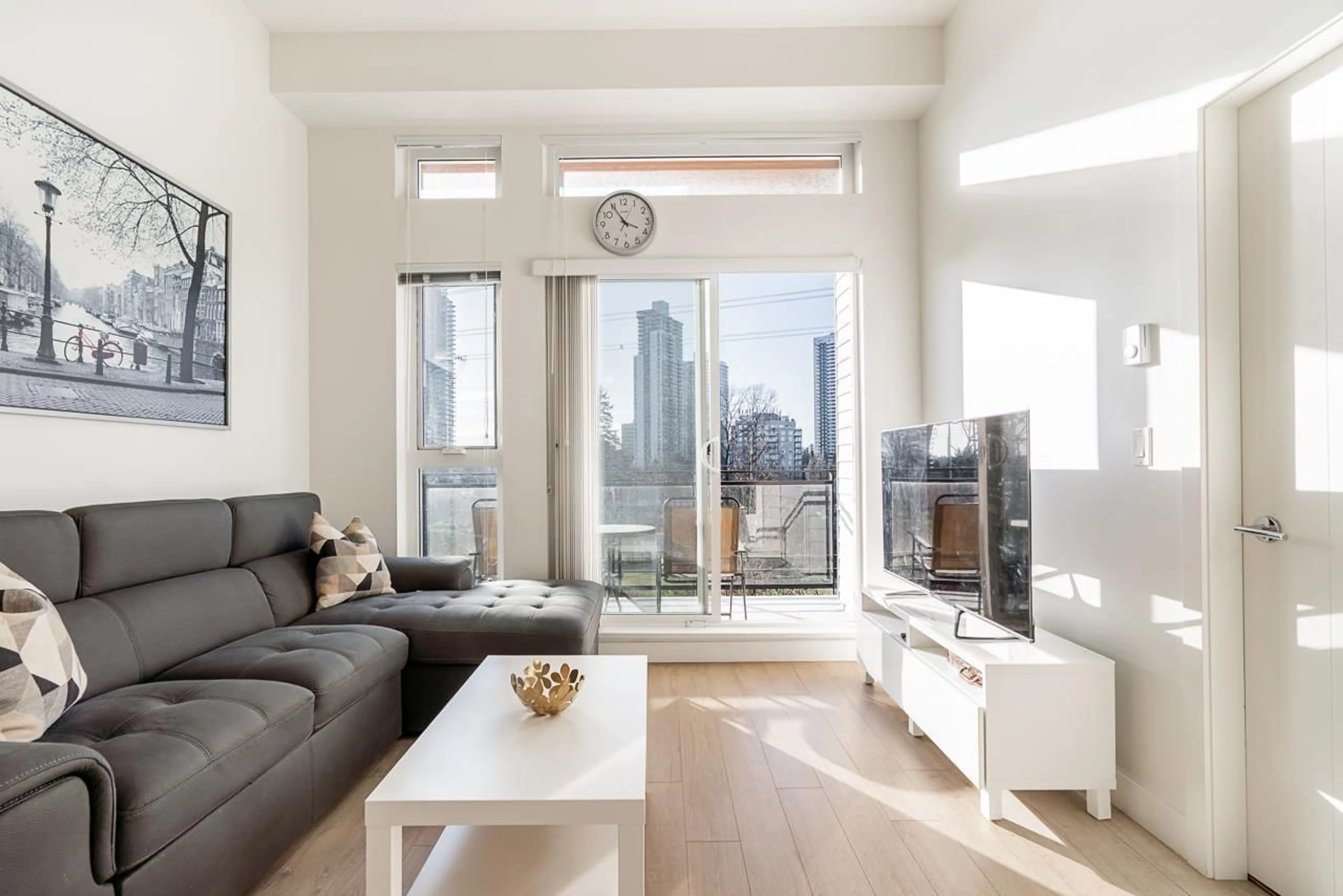 Living room with furniture, wood/laminate floor for 401 - 13919 FRASER HIGHWAY, Surrey British Columbia V3T4E6