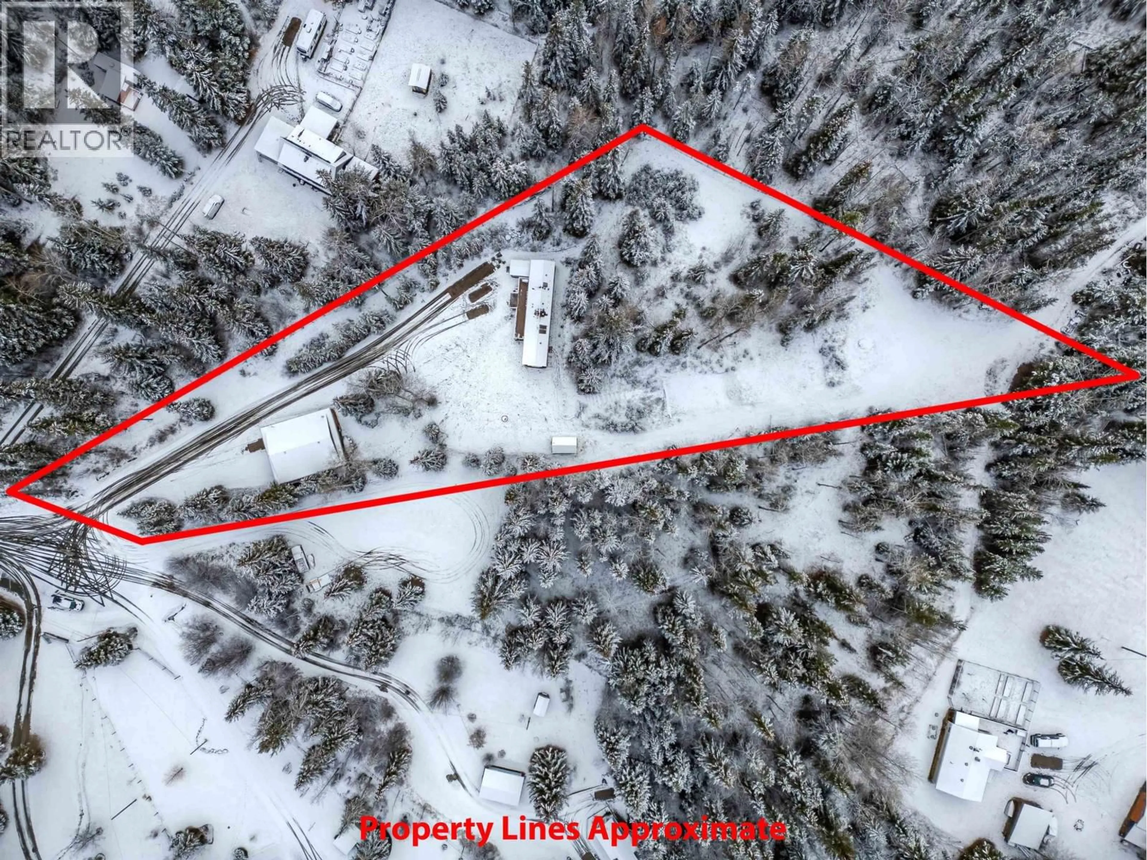 A pic from outside/outdoor area/front of a property/back of a property/a pic from drone, street for 6324 WOLFE ROAD, 100 Mile House British Columbia V0K2E3