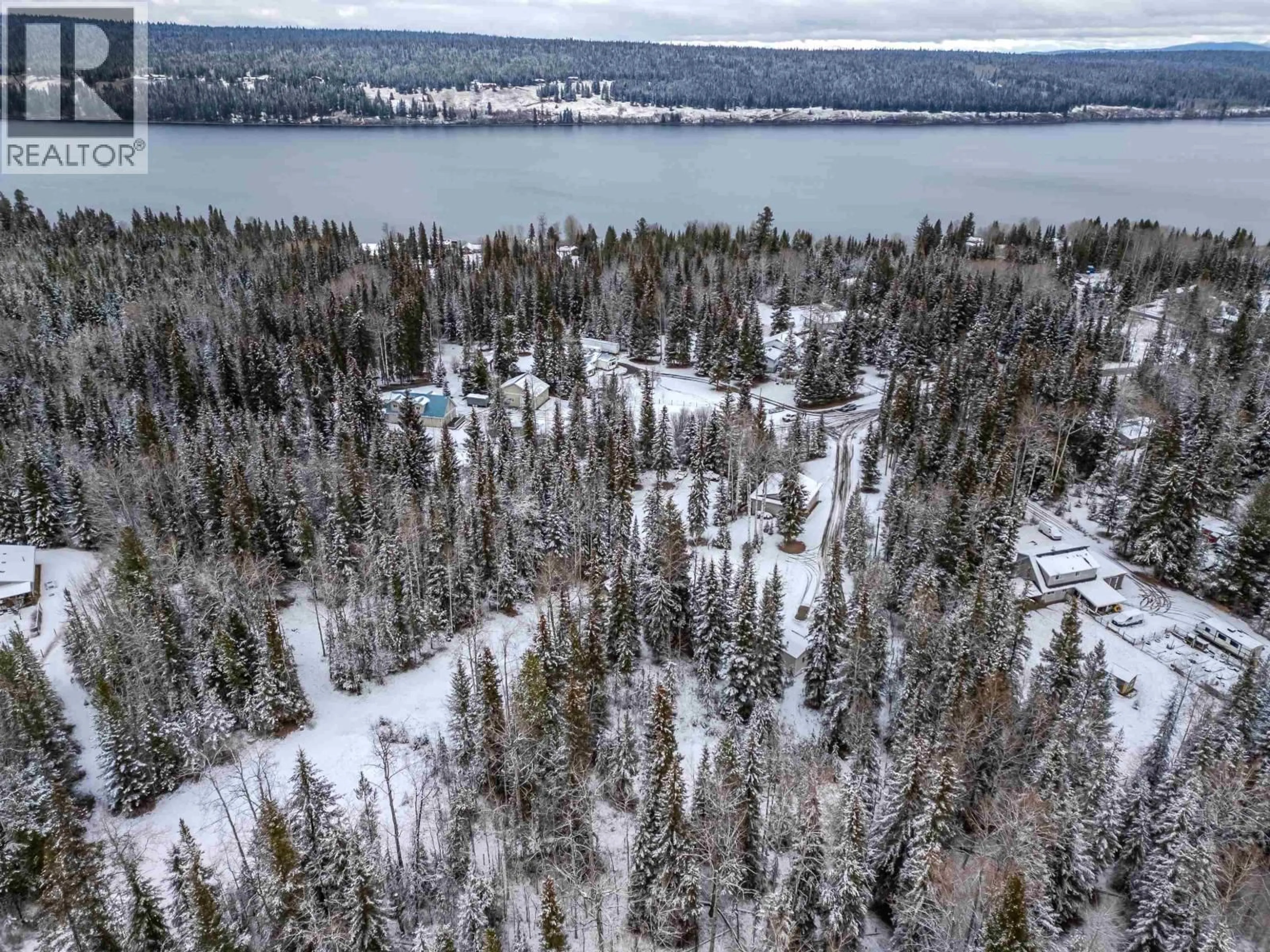 A pic from outside/outdoor area/front of a property/back of a property/a pic from drone, forest/trees view for 6324 WOLFE ROAD, 100 Mile House British Columbia V0K2E3