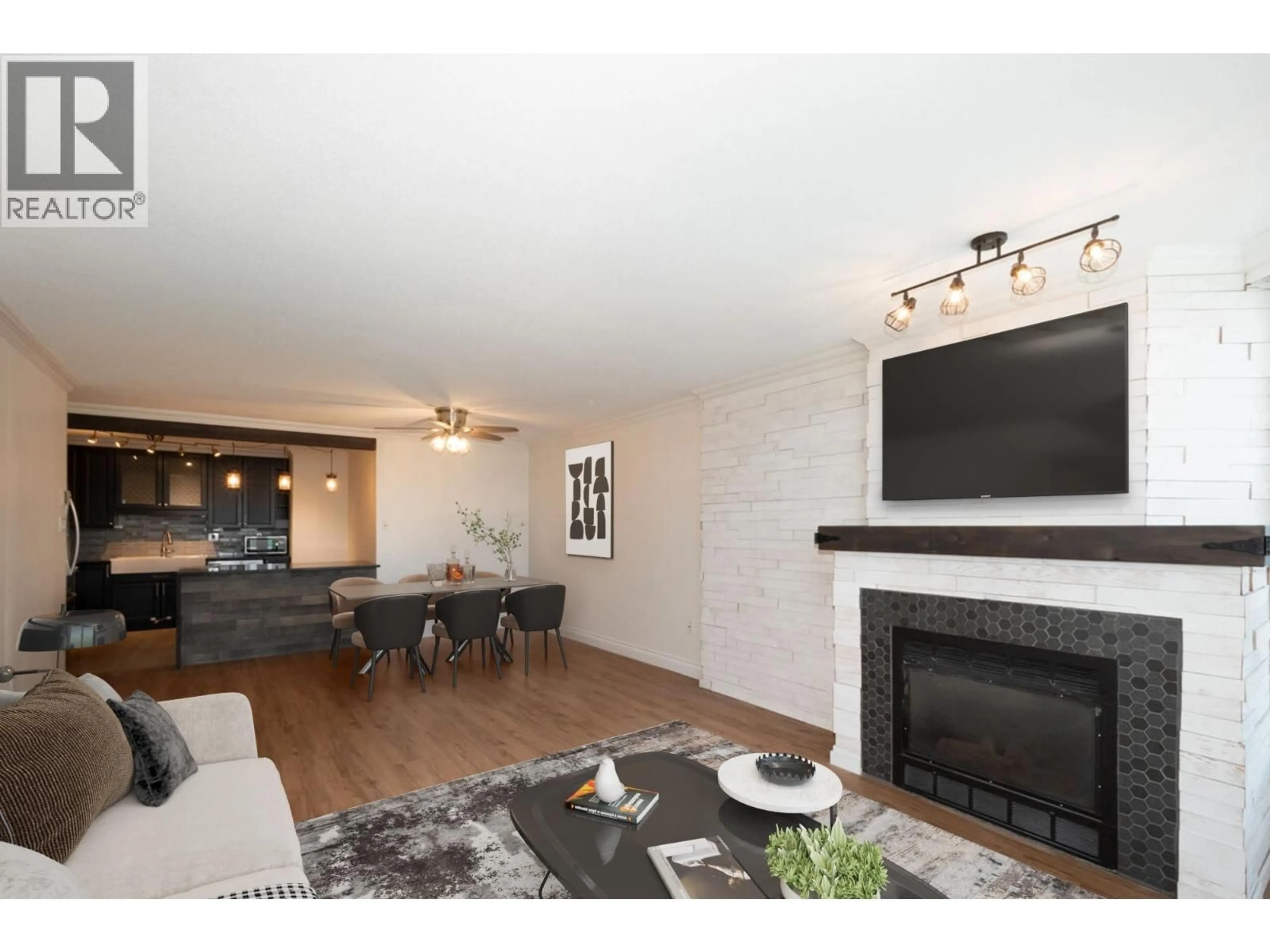 Living room with furniture, wood/laminate floor for 605 - 1245 QUAYSIDE DRIVE, New Westminster British Columbia V3M6J6