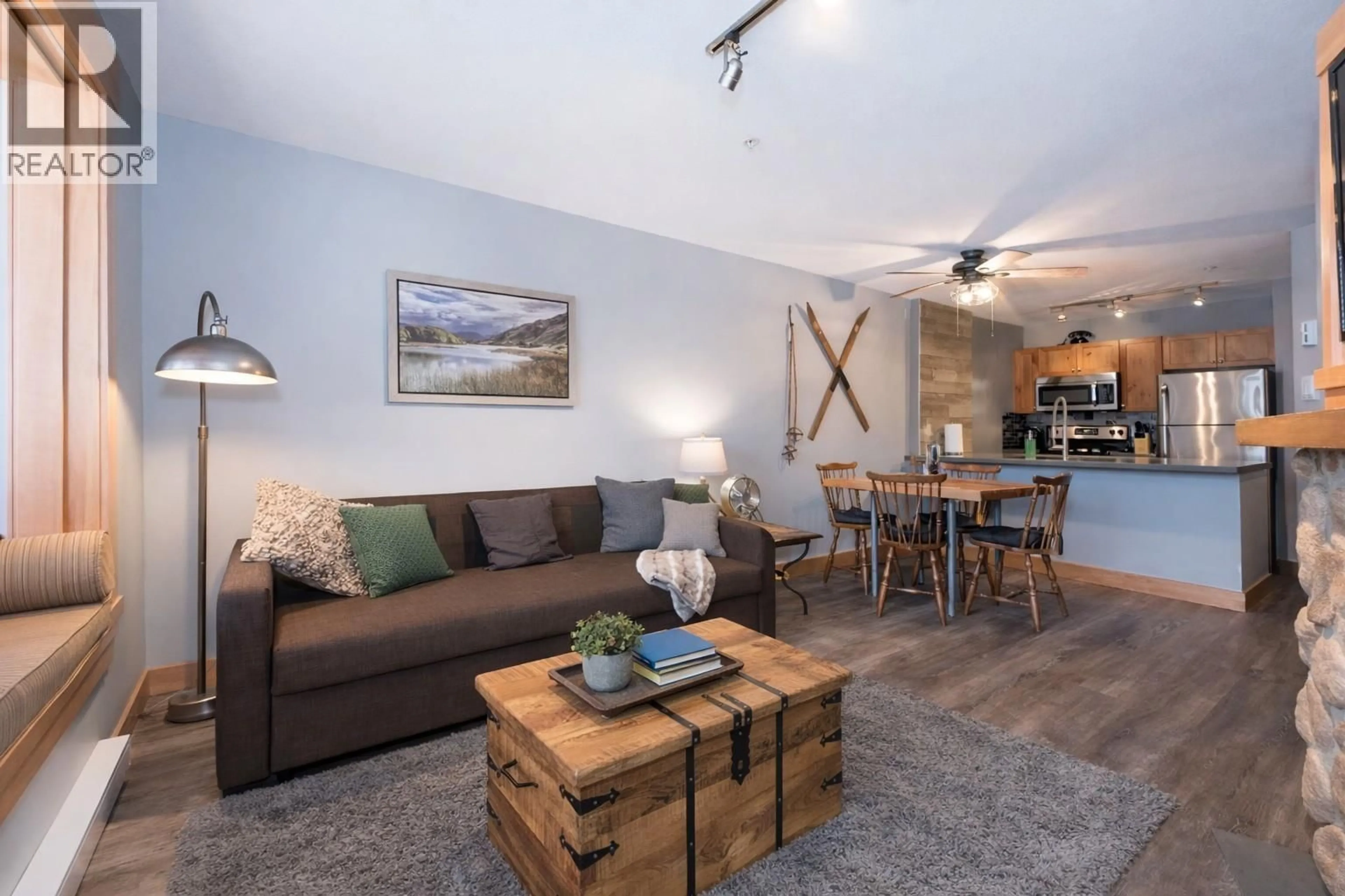 Living room with furniture, wood/laminate floor for 433 - 4314 MAIN STREET, Whistler British Columbia V8E1A8