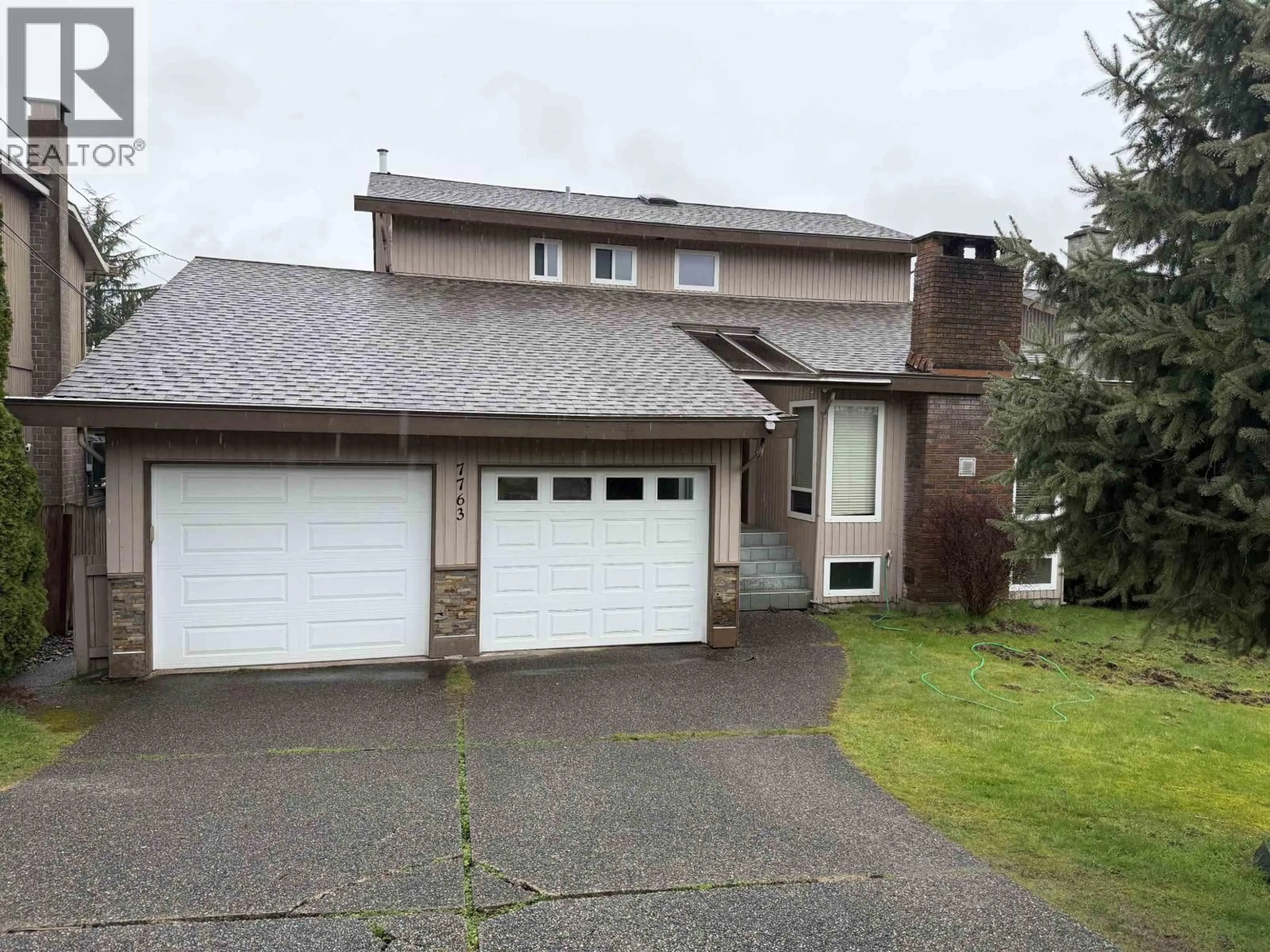 Home with vinyl exterior material, street for 7763 HAZELMERE STREET, Burnaby British Columbia V5E2B3