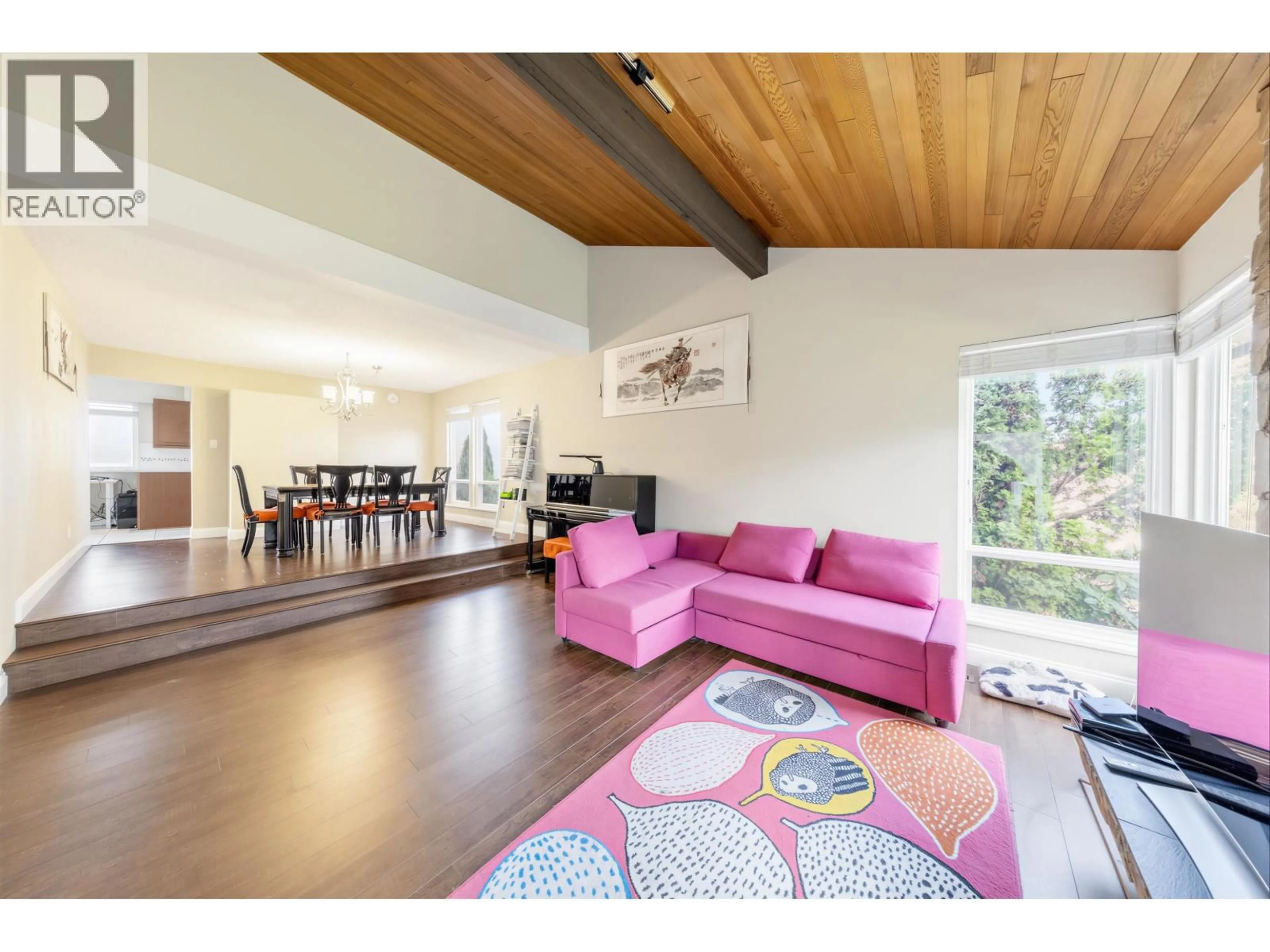 Living room with furniture, wood/laminate floor for 7763 HAZELMERE STREET, Burnaby British Columbia V5E2B3