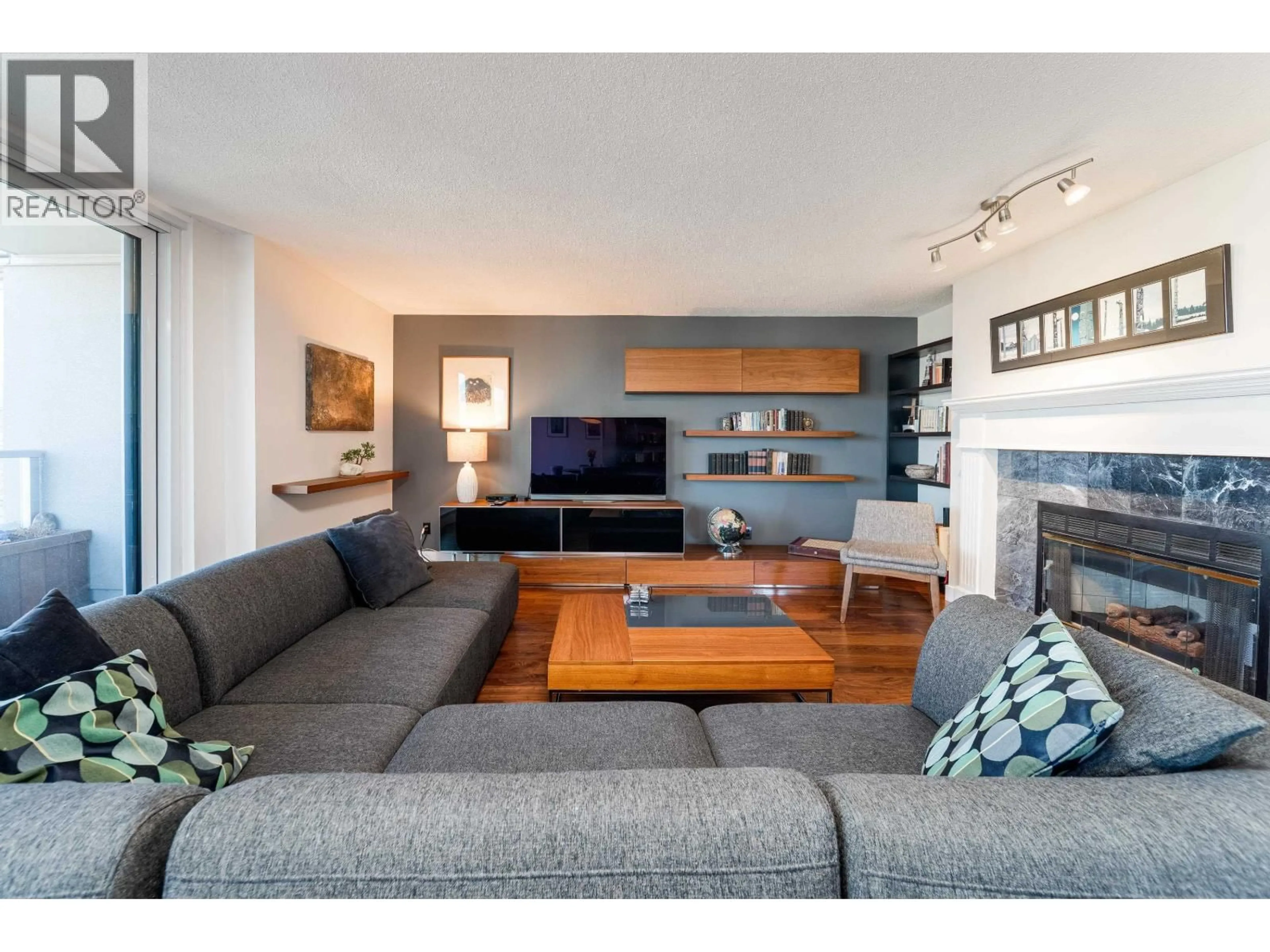 Living room with furniture, wood/laminate floor for 901 - 1566 13TH AVENUE, Vancouver British Columbia V6J2G4