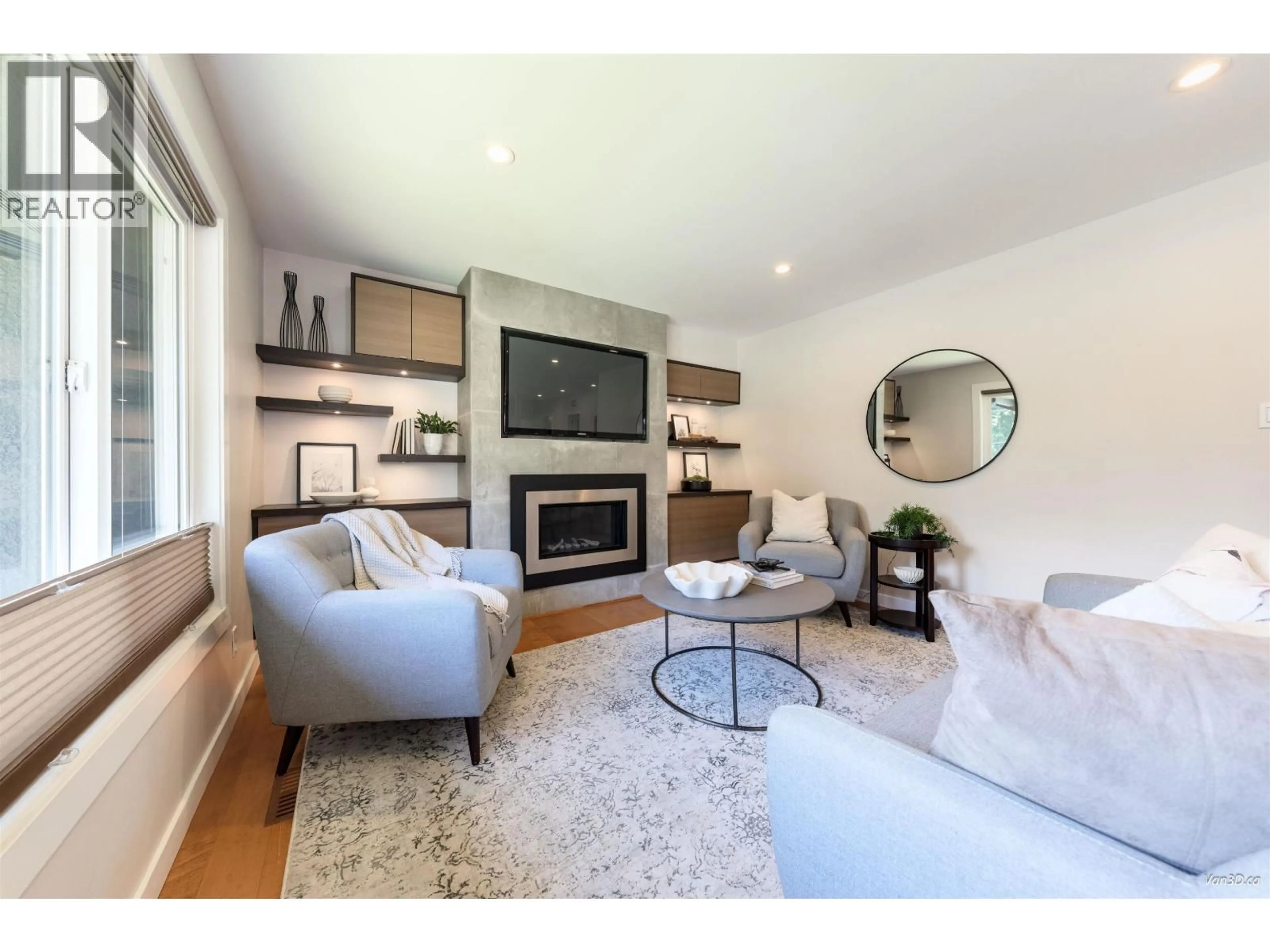 Living room with furniture, wood/laminate floor for 949 HARTFORD PLACE, North Vancouver British Columbia V7H2J8