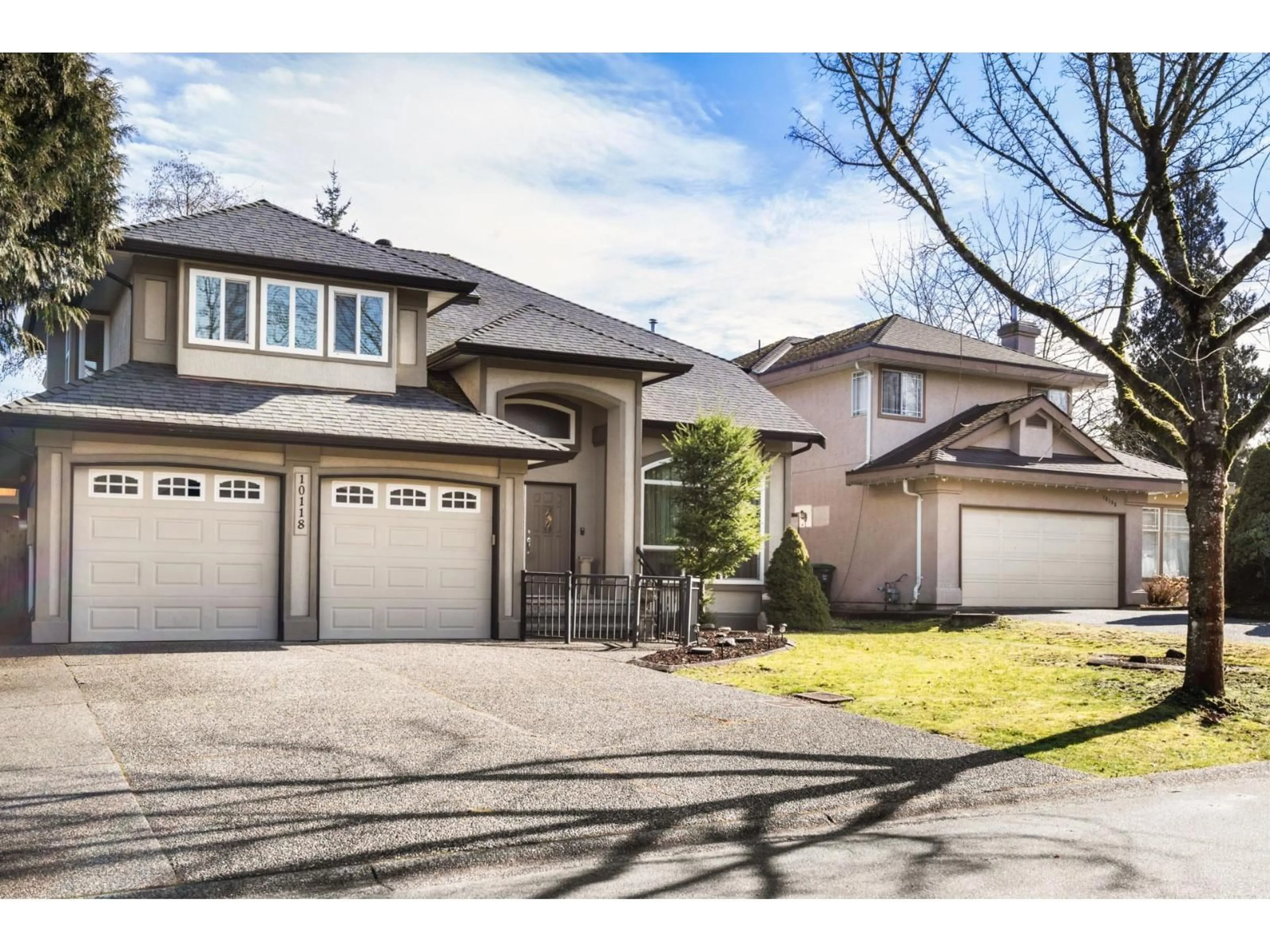 Home with vinyl exterior material, street for 10118 171A STREET, Surrey British Columbia V4N3L3