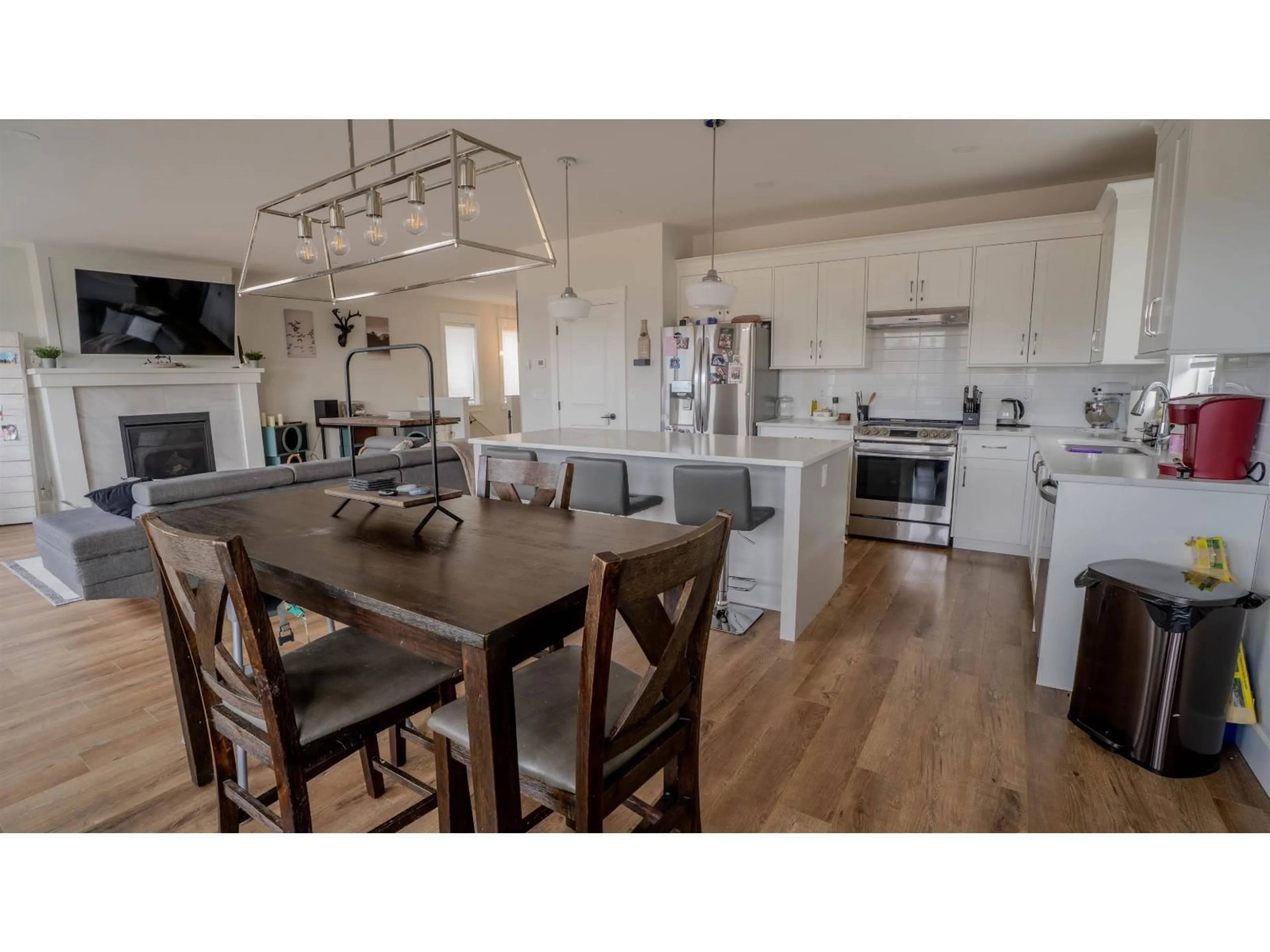 Open concept kitchen, wood/laminate floor for 9279 SITKA PLACE, Chilliwack British Columbia V2P8B6