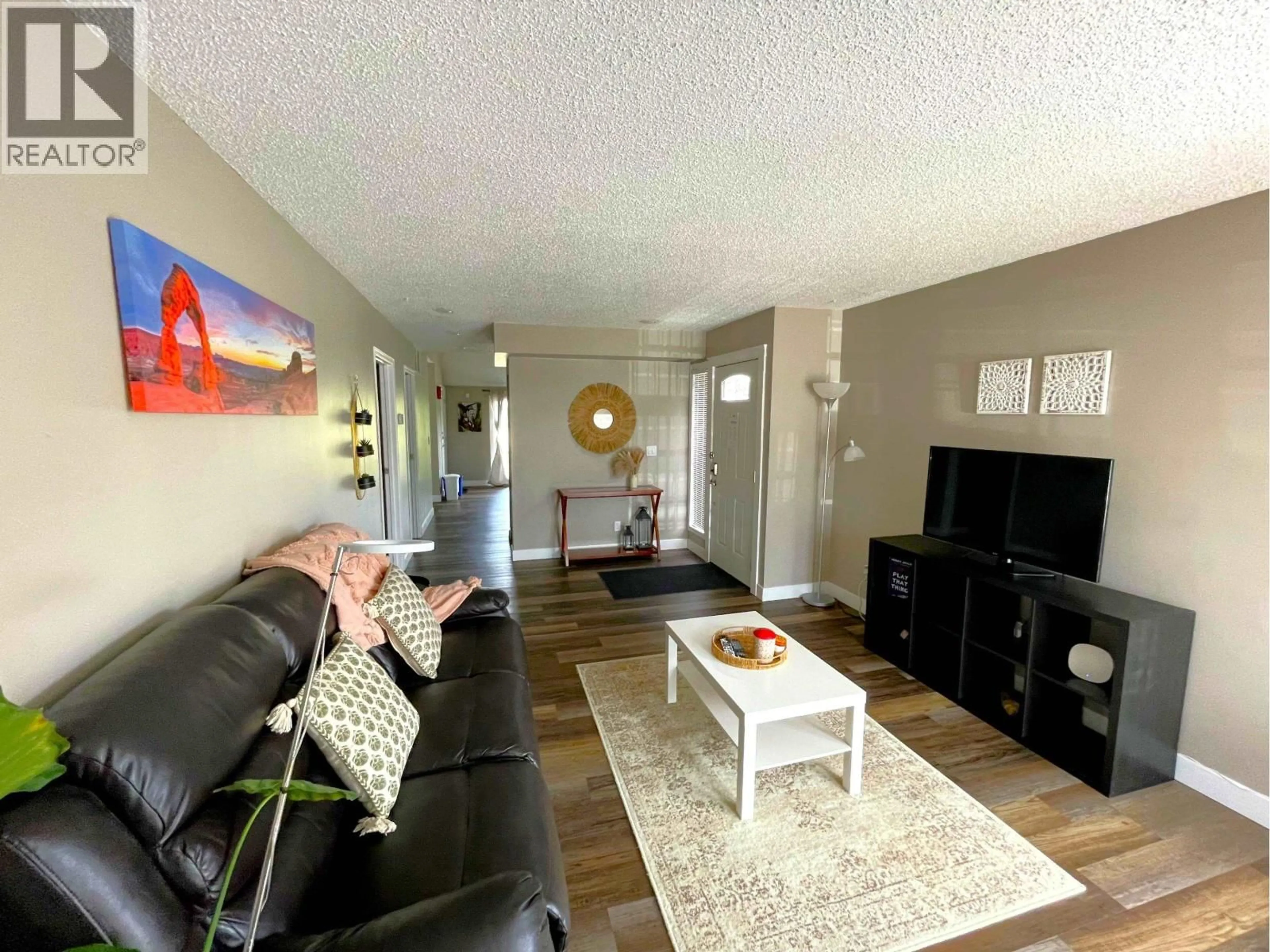 Living room with furniture, unknown for 9102 112 AVENUE, Fort St. John British Columbia V1J5H8