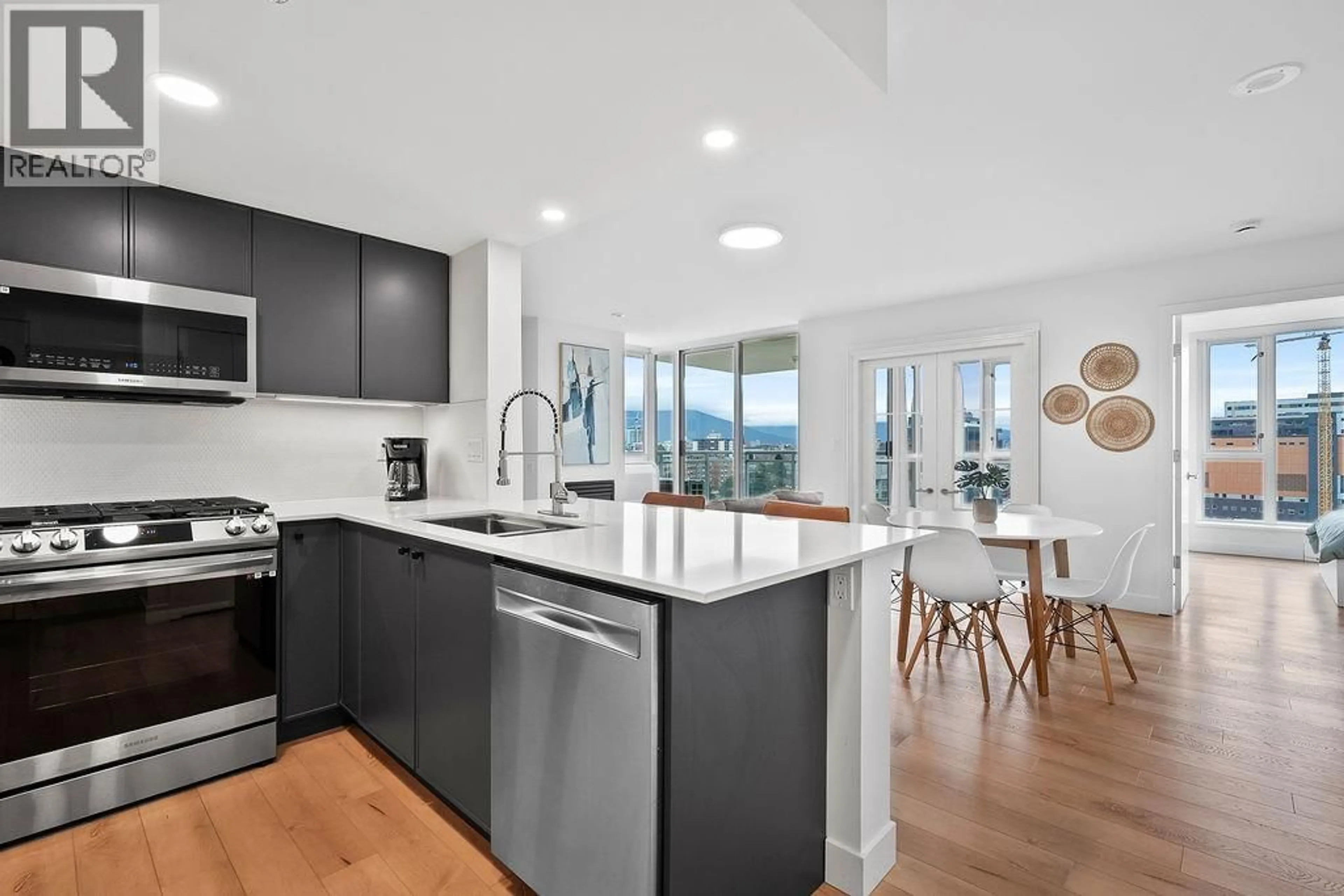 Open concept kitchen, ceramic/tile floor for 1302 - 120 MILROSS AVENUE, Vancouver British Columbia V6A4K7