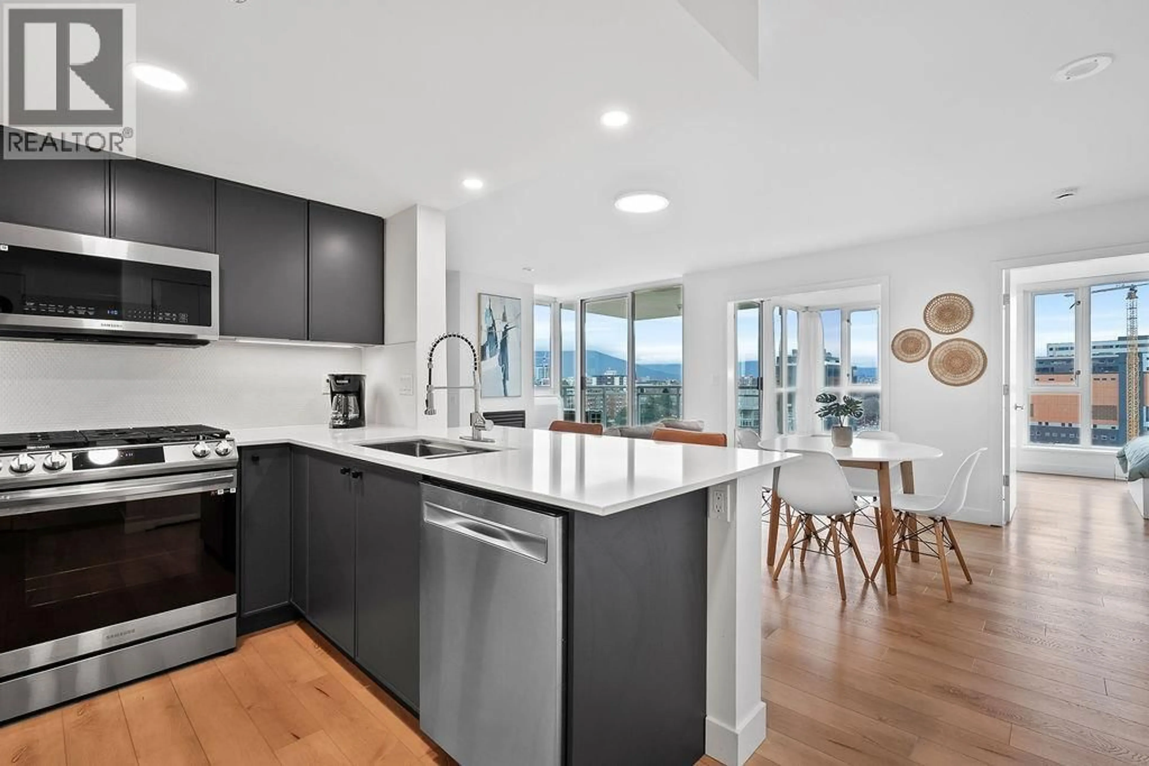 Open concept kitchen, ceramic/tile floor for 1302 - 120 MILROSS AVENUE, Vancouver British Columbia V6A4K7
