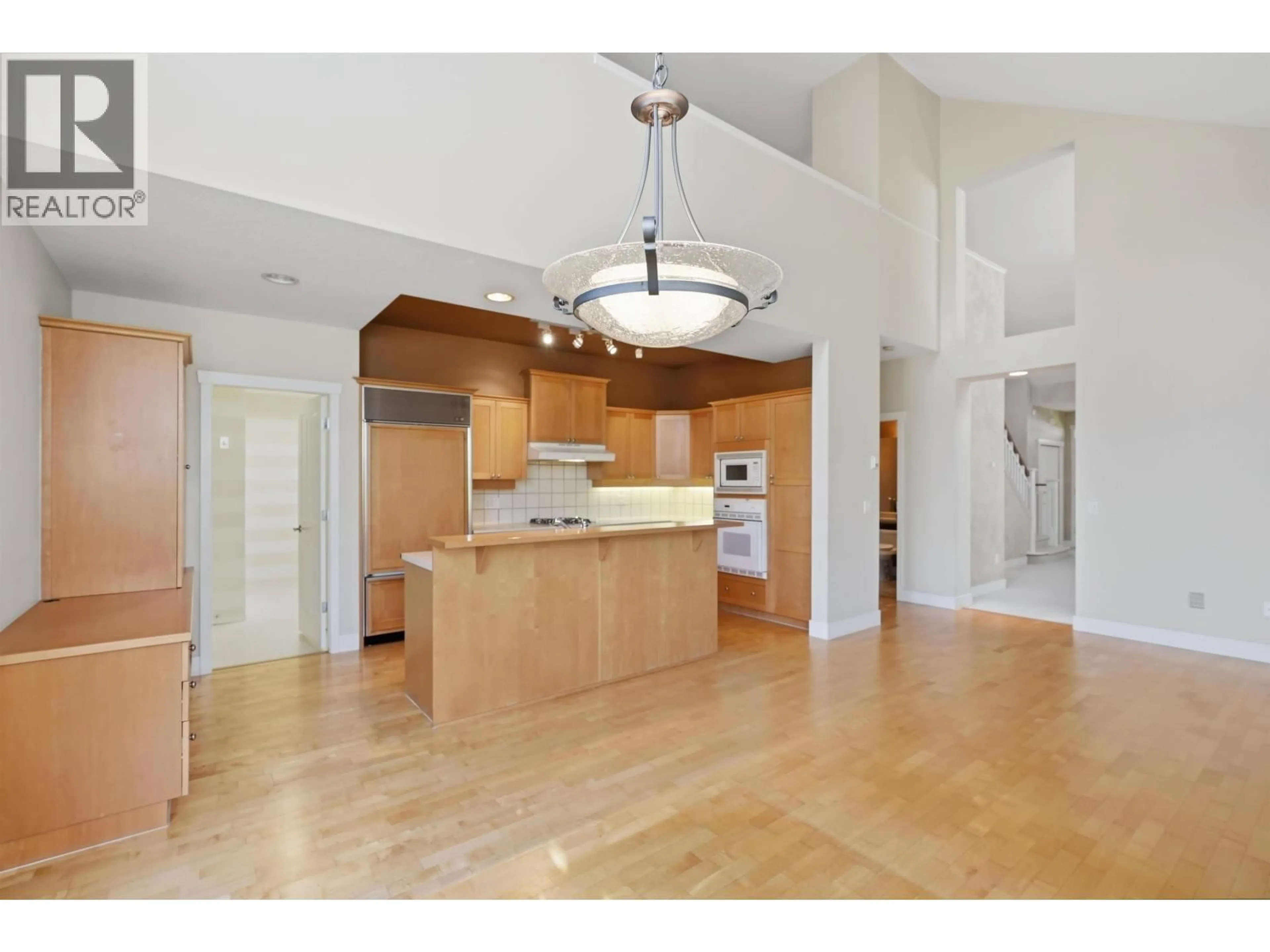 Open concept kitchen, wood/laminate floor for 2 - 5900 FERRY ROAD, Delta British Columbia V4K5C3